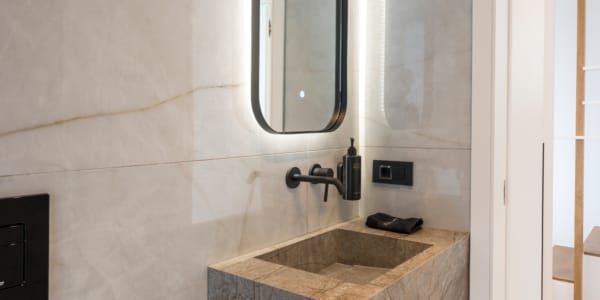 a sink and mirror in a bathroom