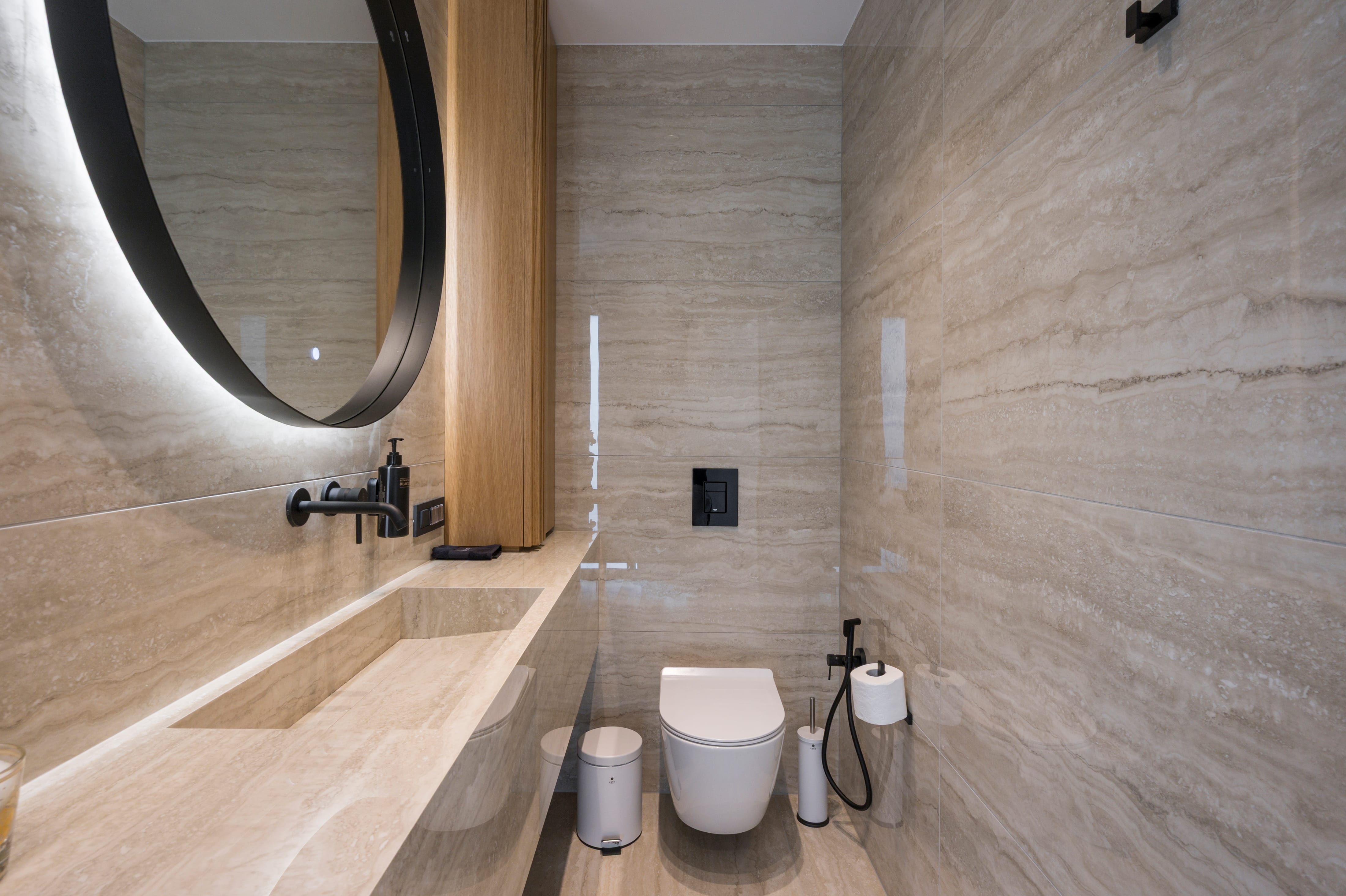 a bathroom with a sink and toilet