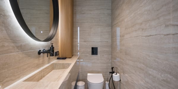 a bathroom with a sink and toilet