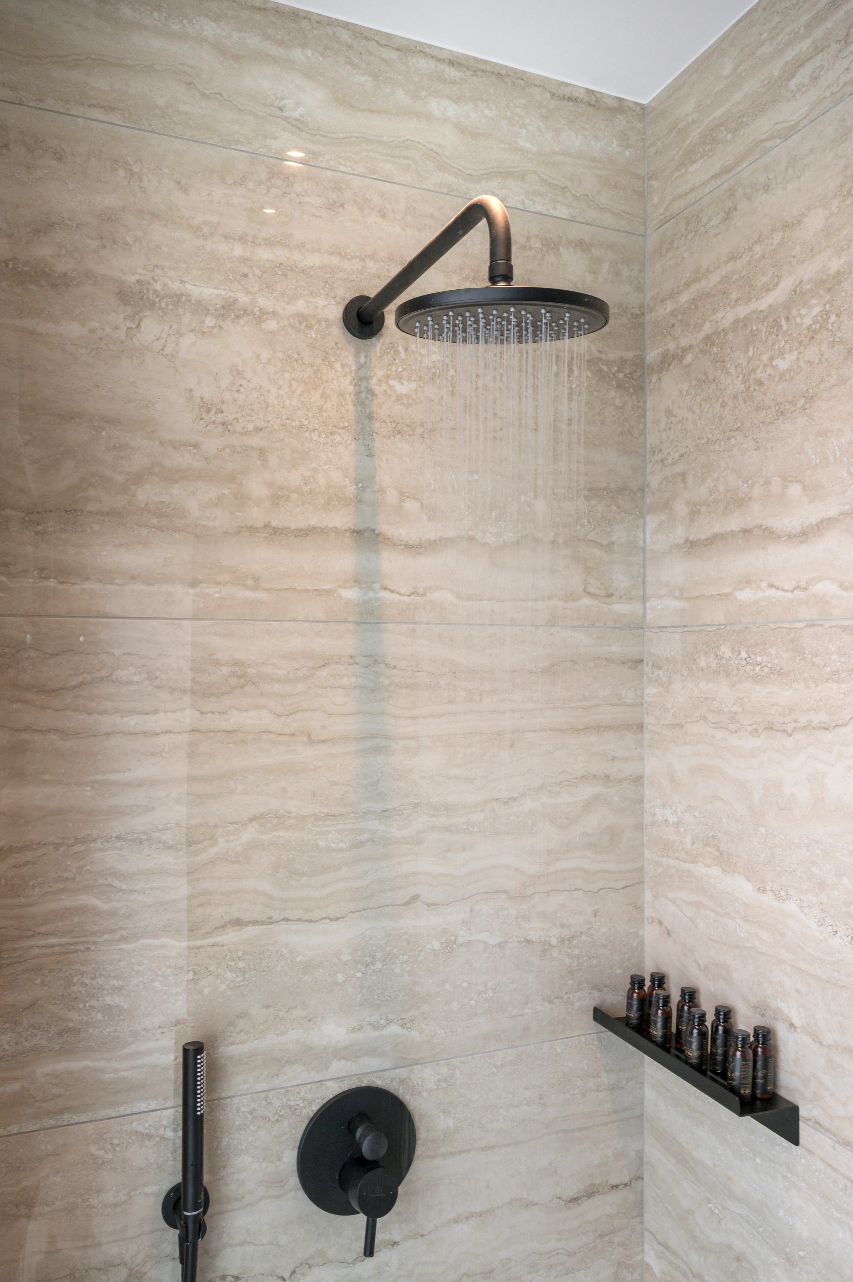 a shower head with water running from it