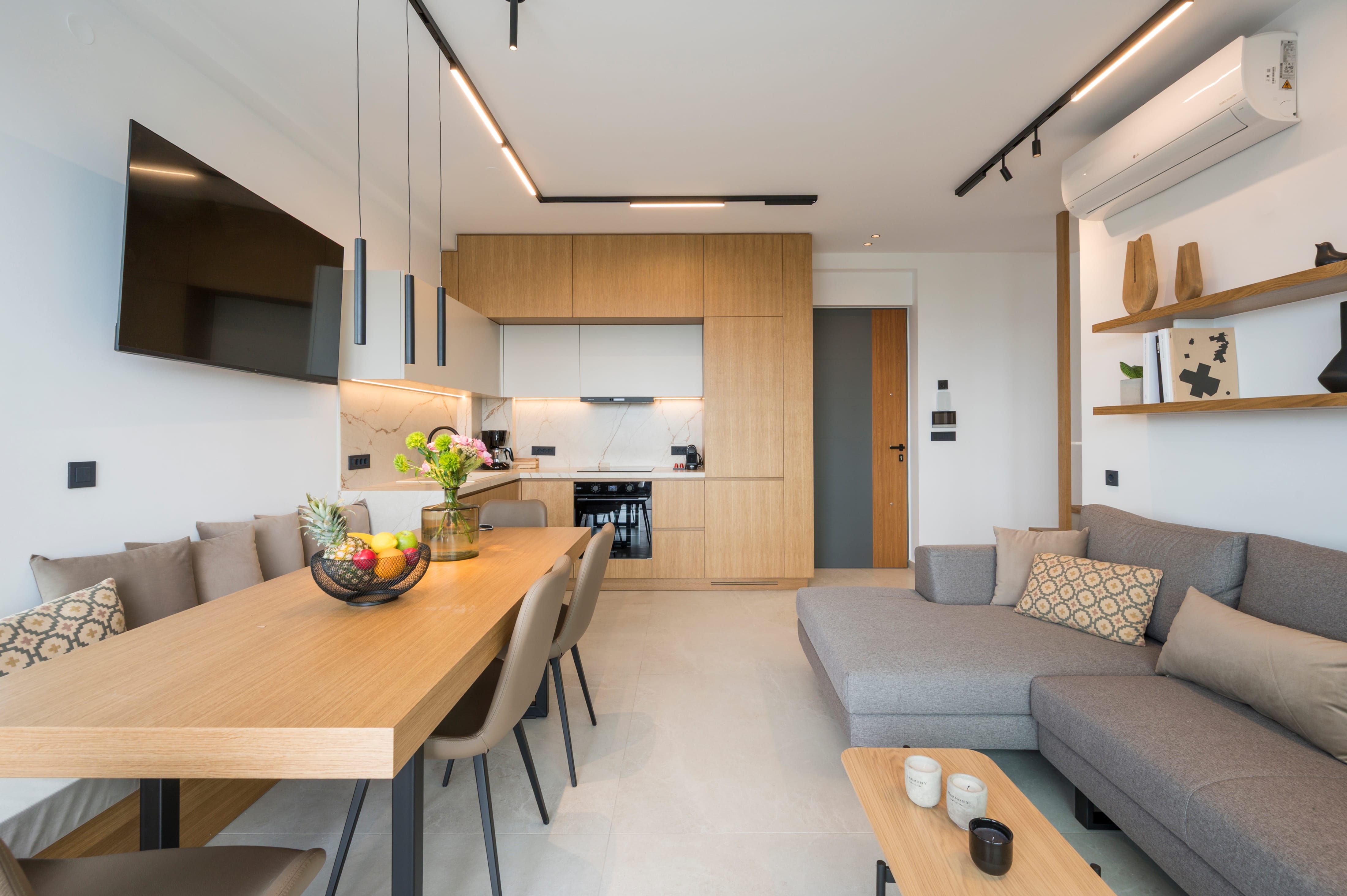 a living room with a table and a couch