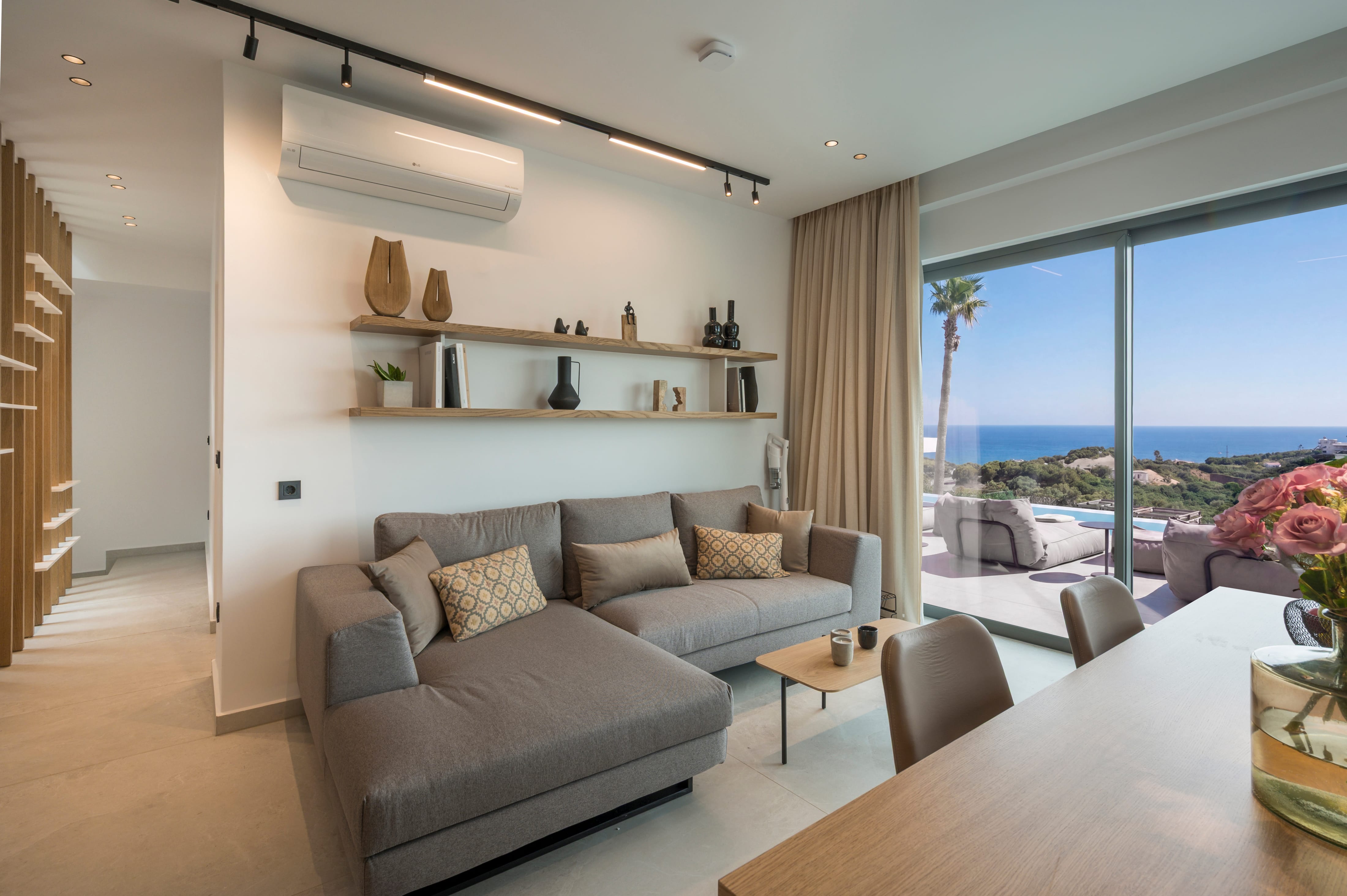a living room with a table and couch