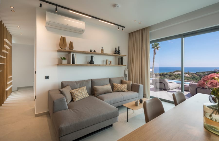 a living room with a table and couch