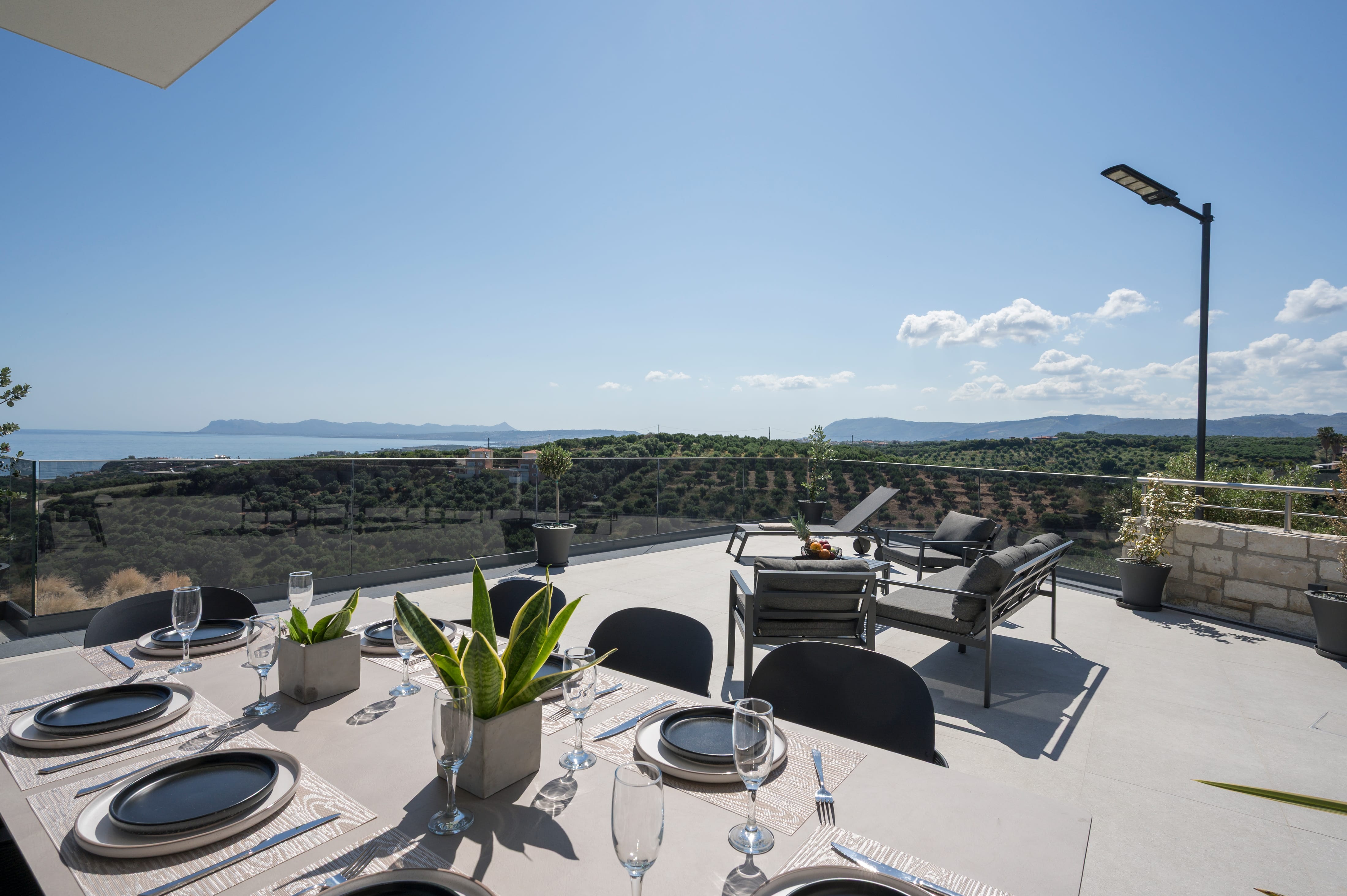 a table set for a meal on a deck