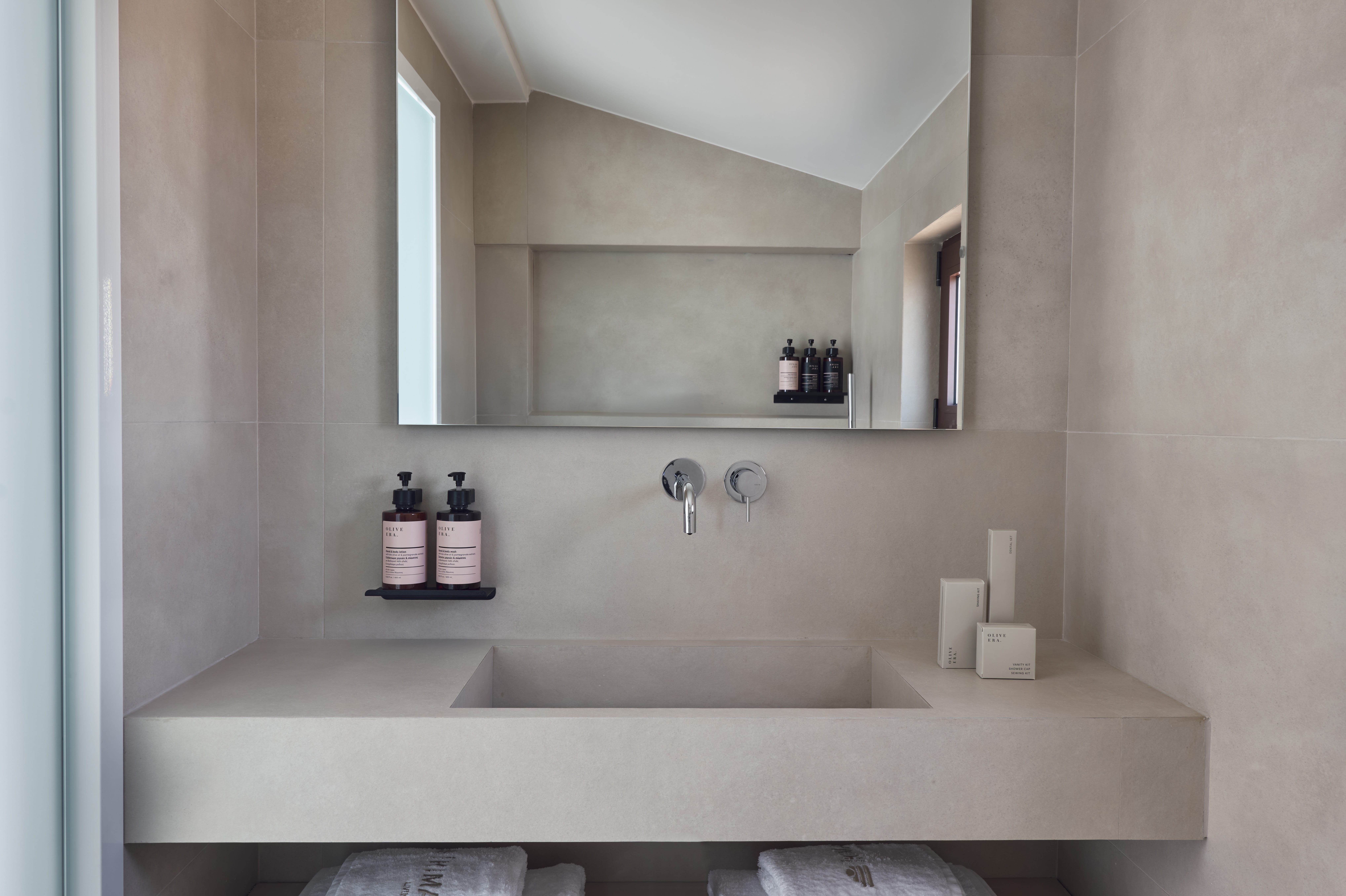 a bathroom with a large mirror