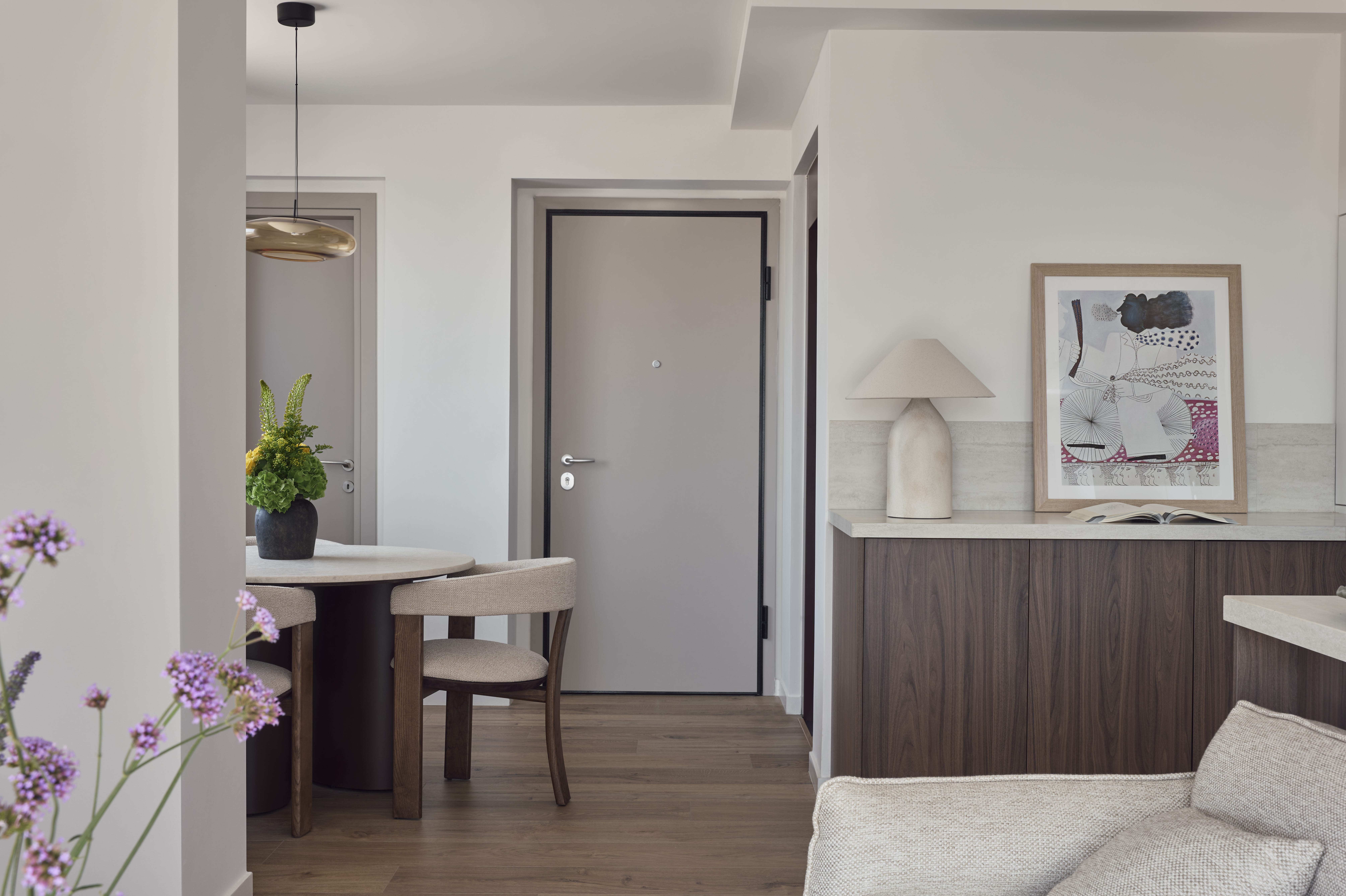 a room with a table and chairs