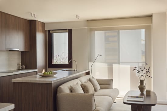 a living room with a couch and a table