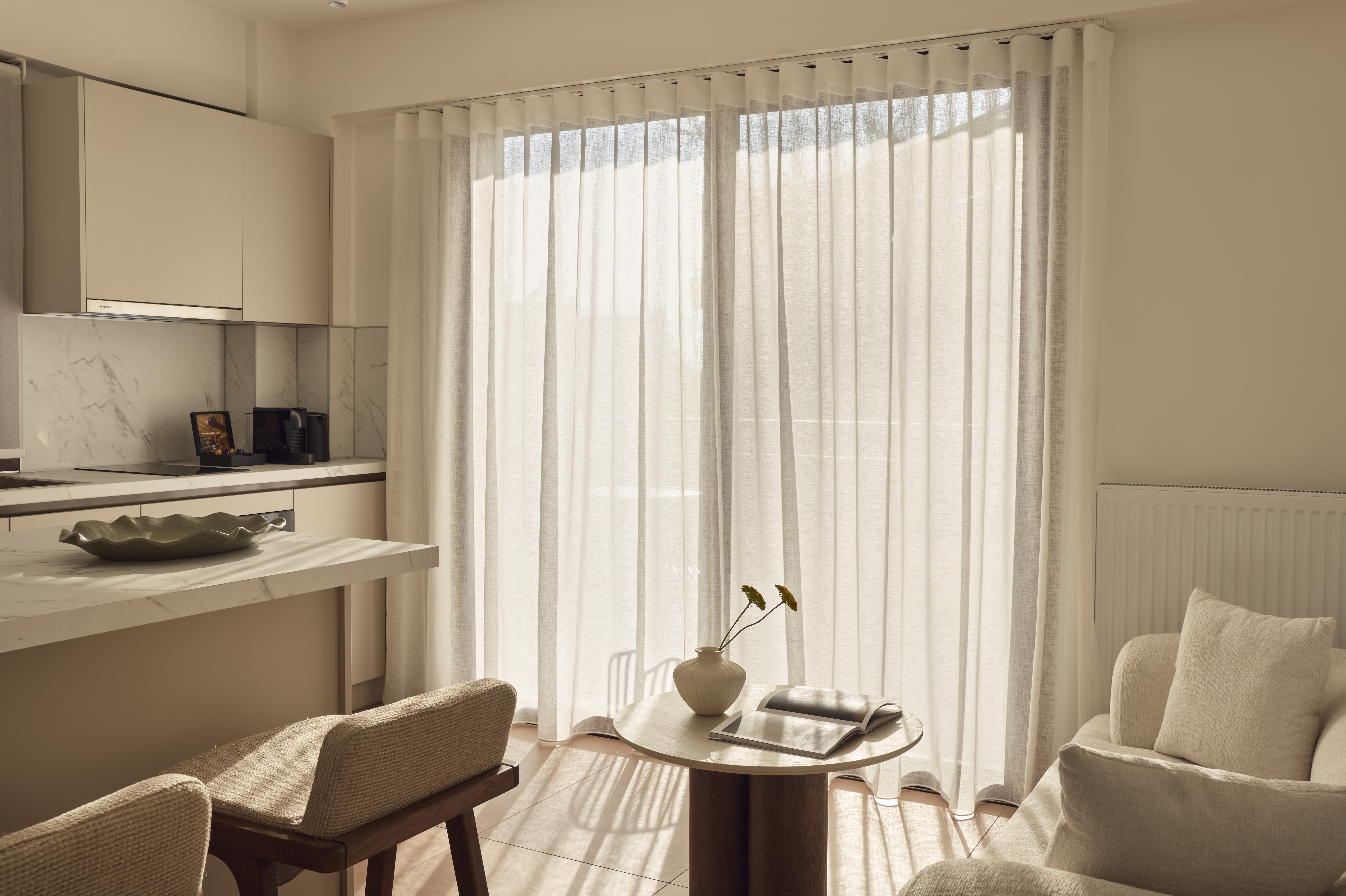 a room with a table and chairs