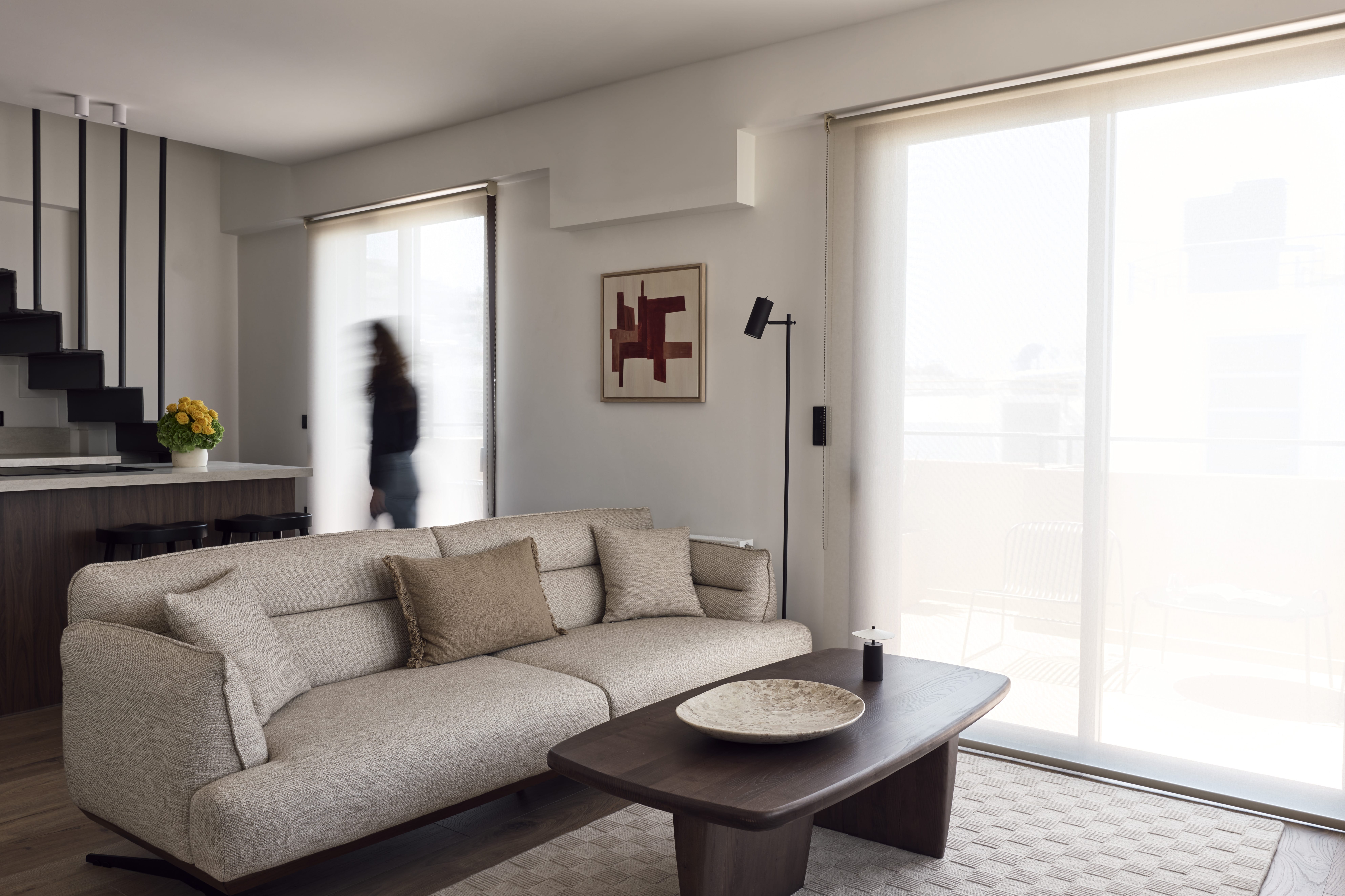 a living room with a couch and a coffee table