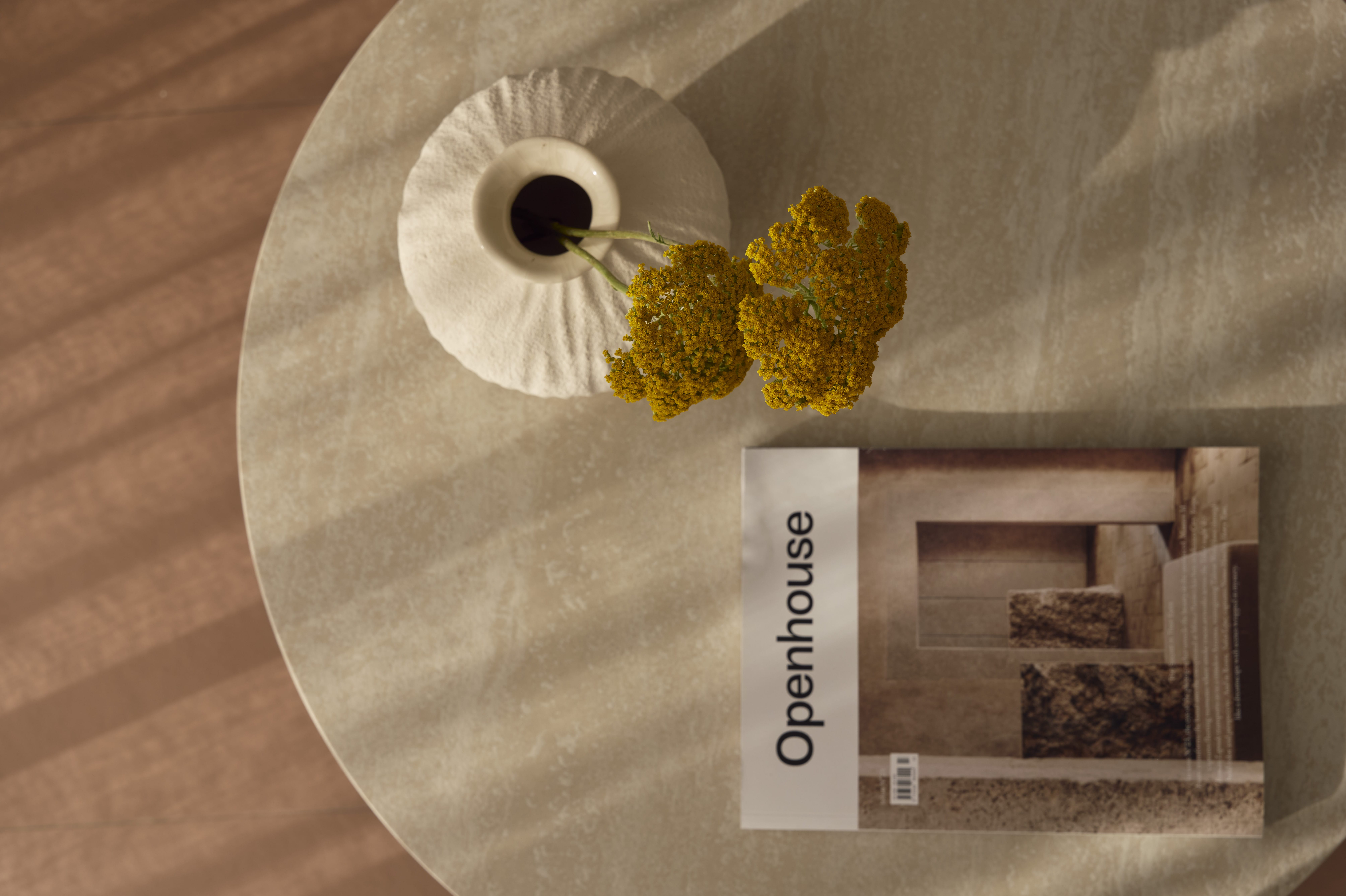 a fan with yellow flowers