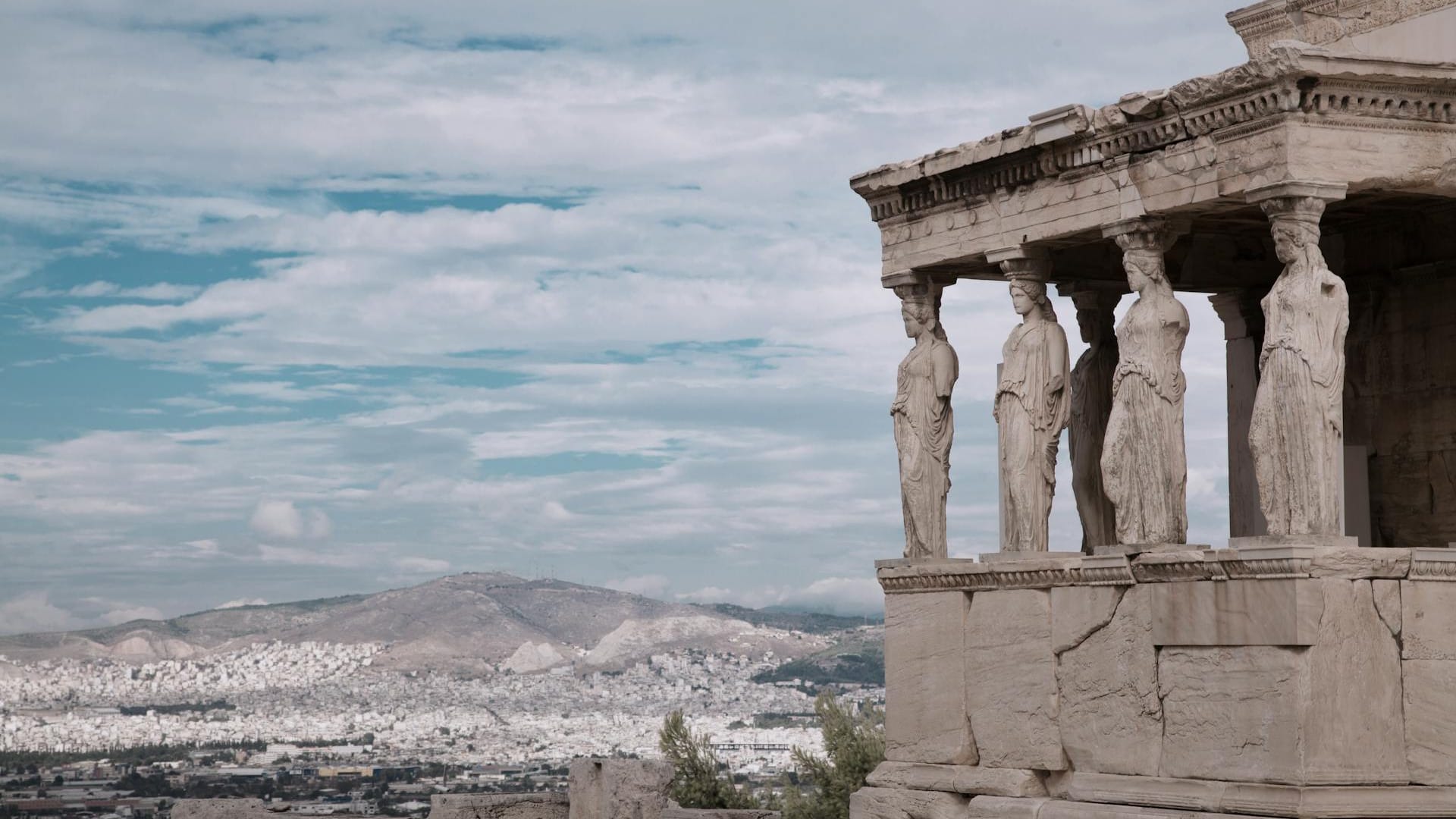 a stone building with pillars