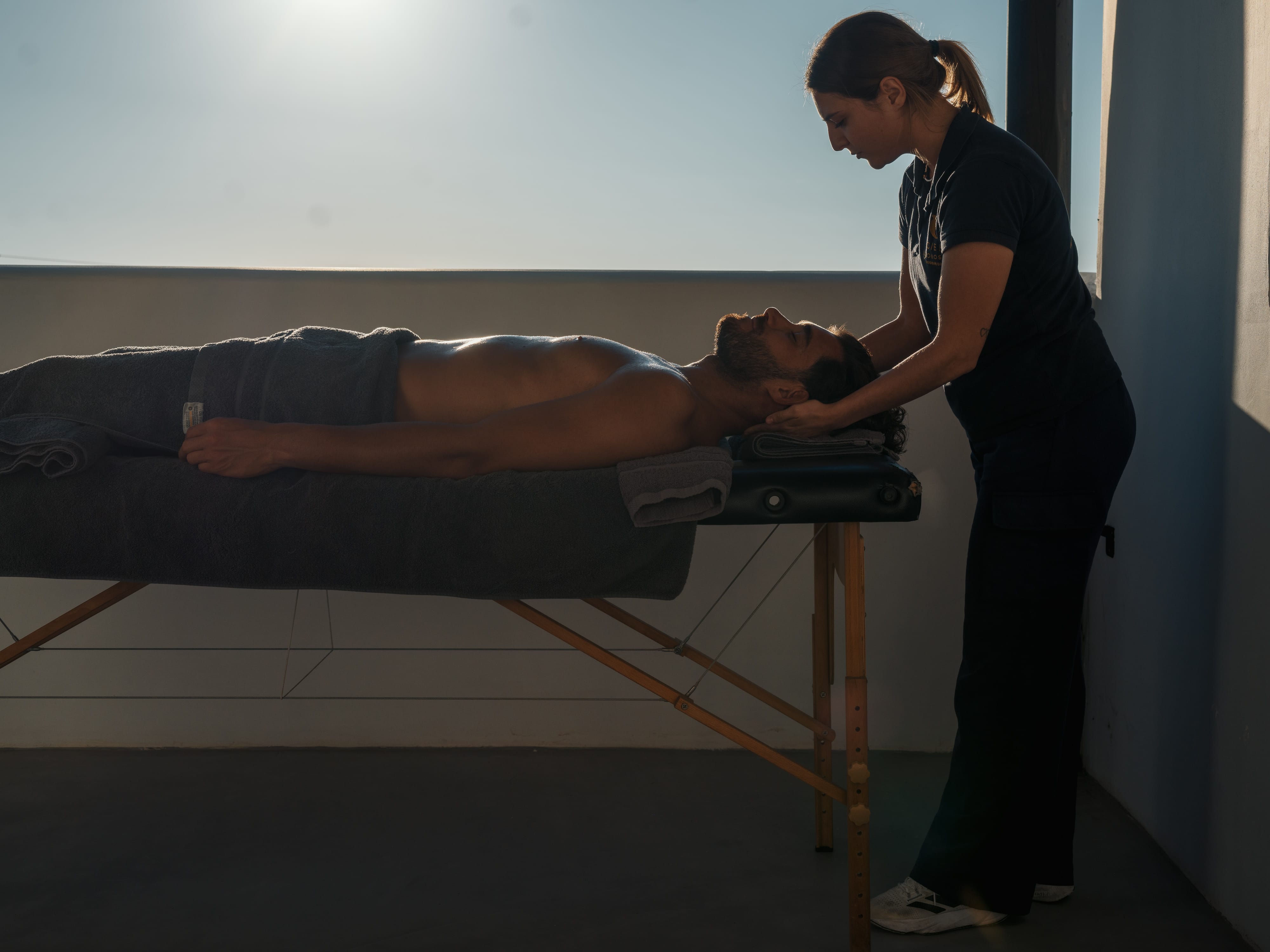 a man working on a man's body