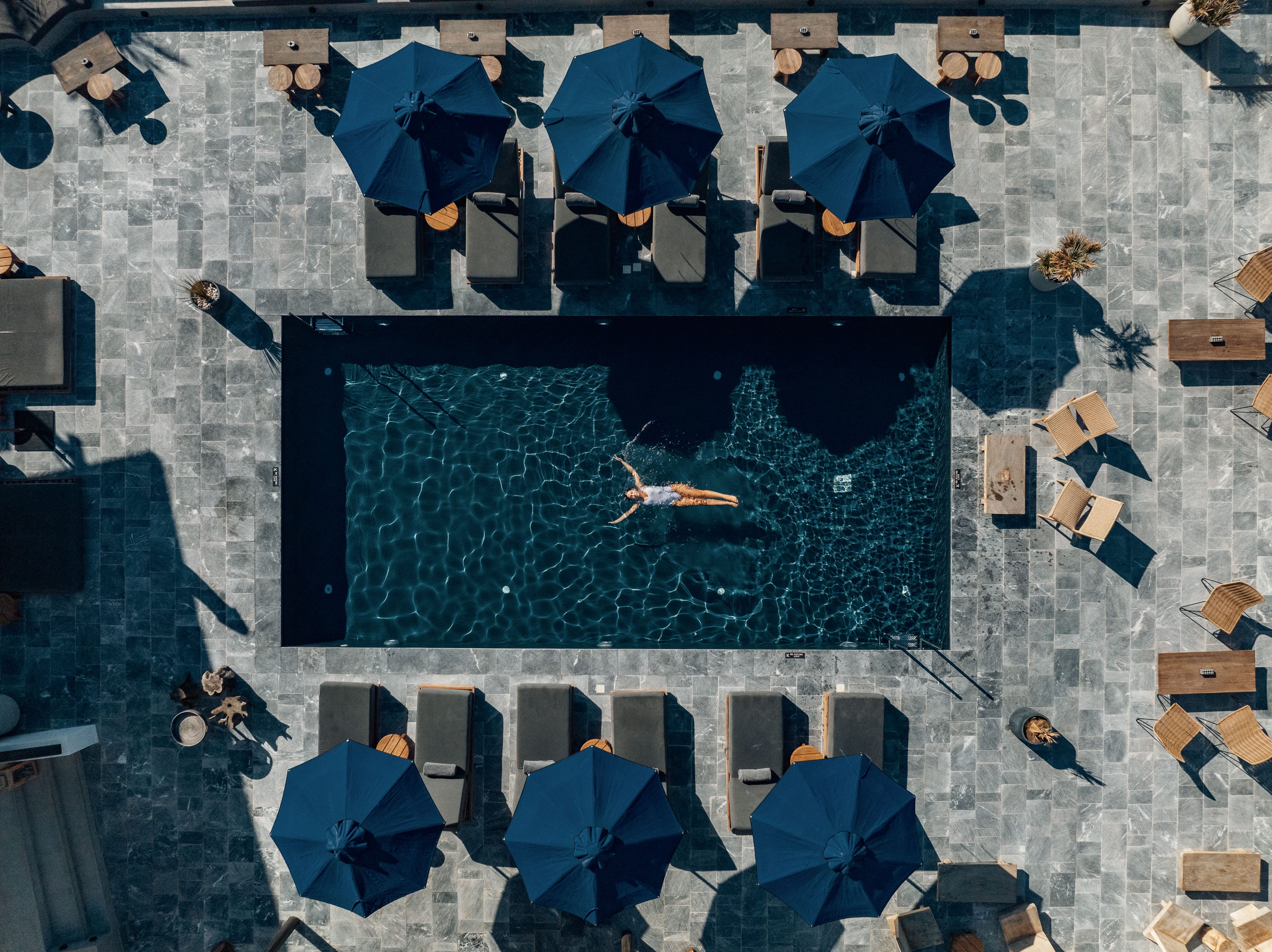 a group of people with umbrellas