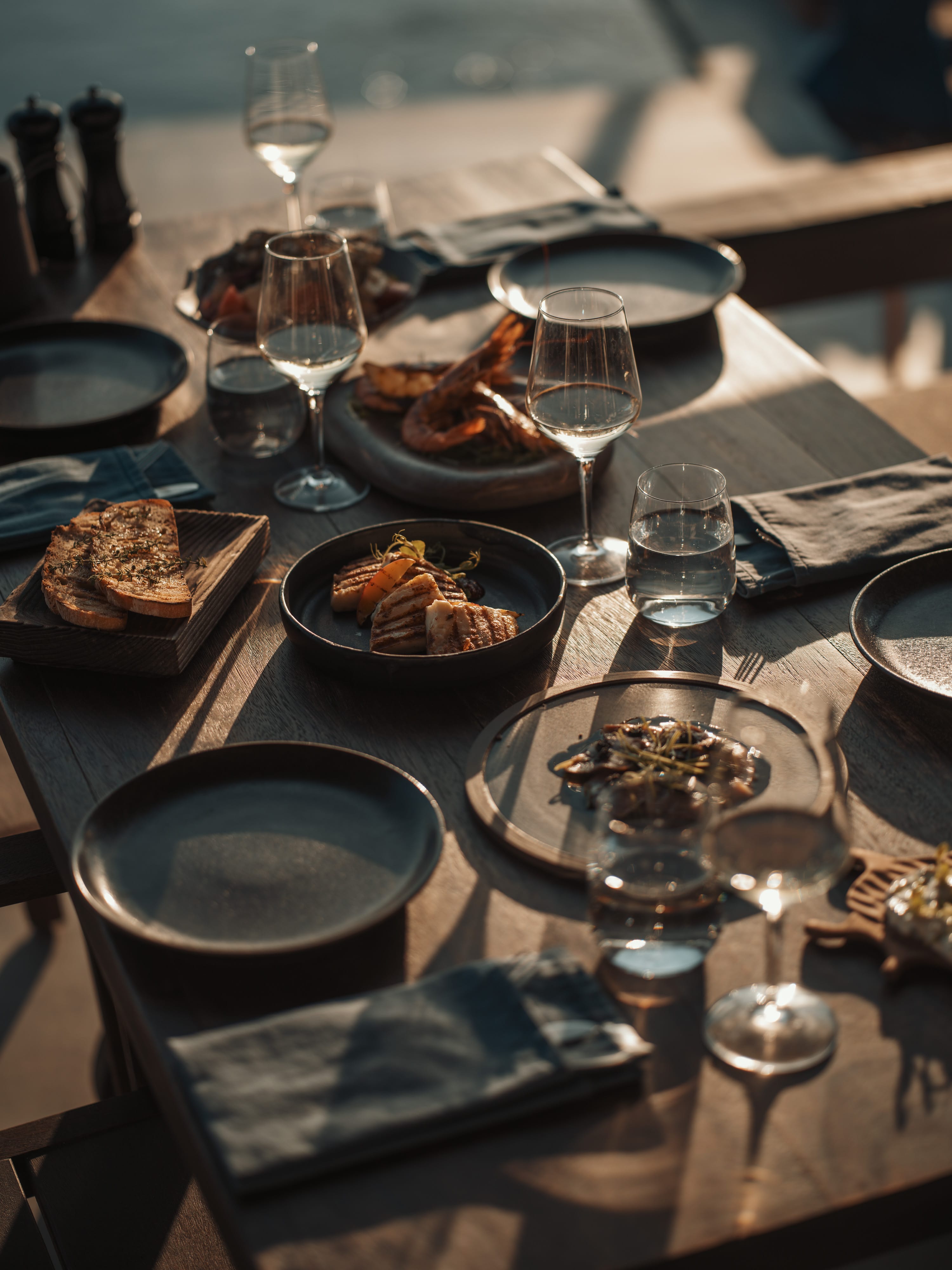 a table with plates and glasses