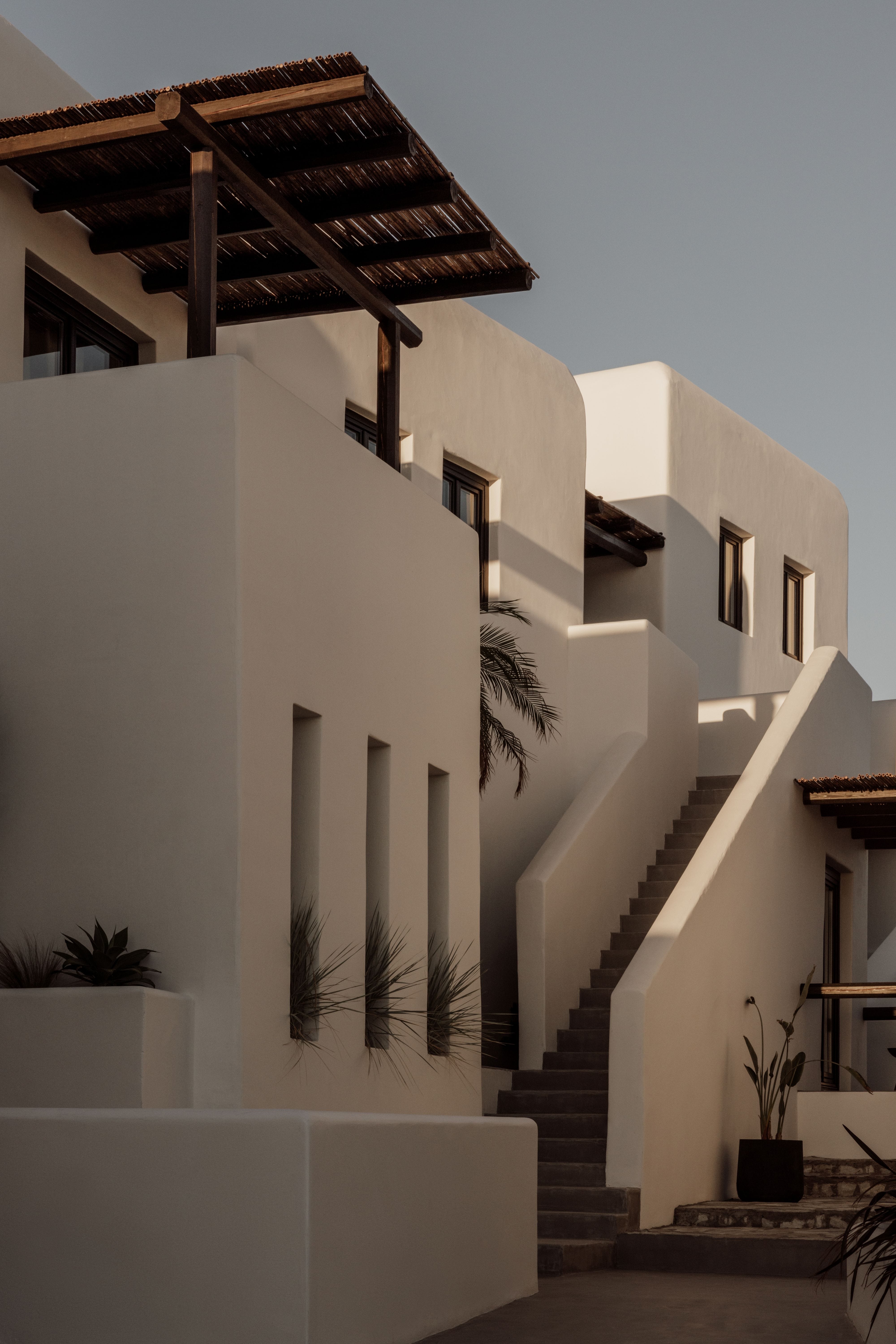 a building with pillars and stairs