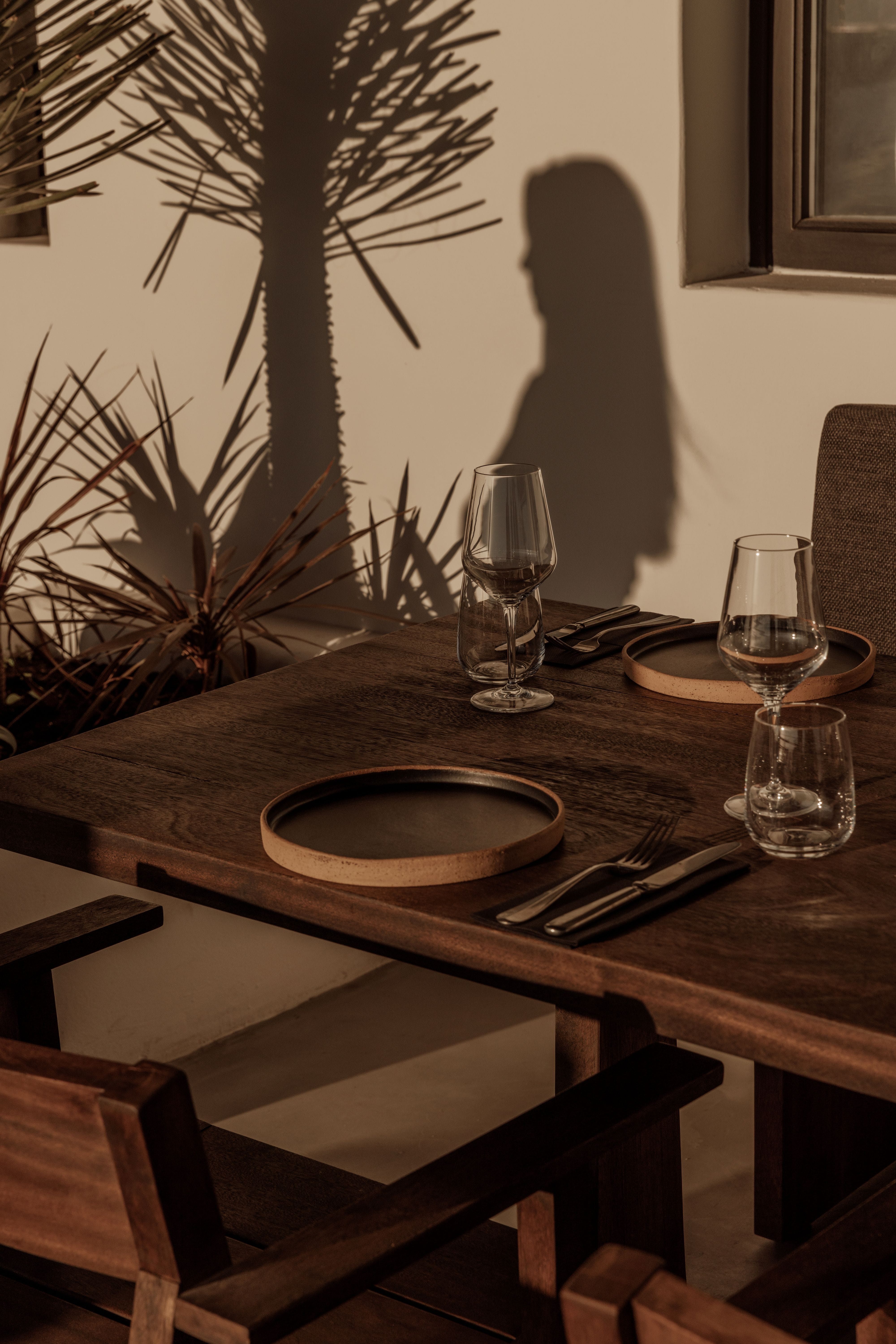 a table with plates and glasses on it