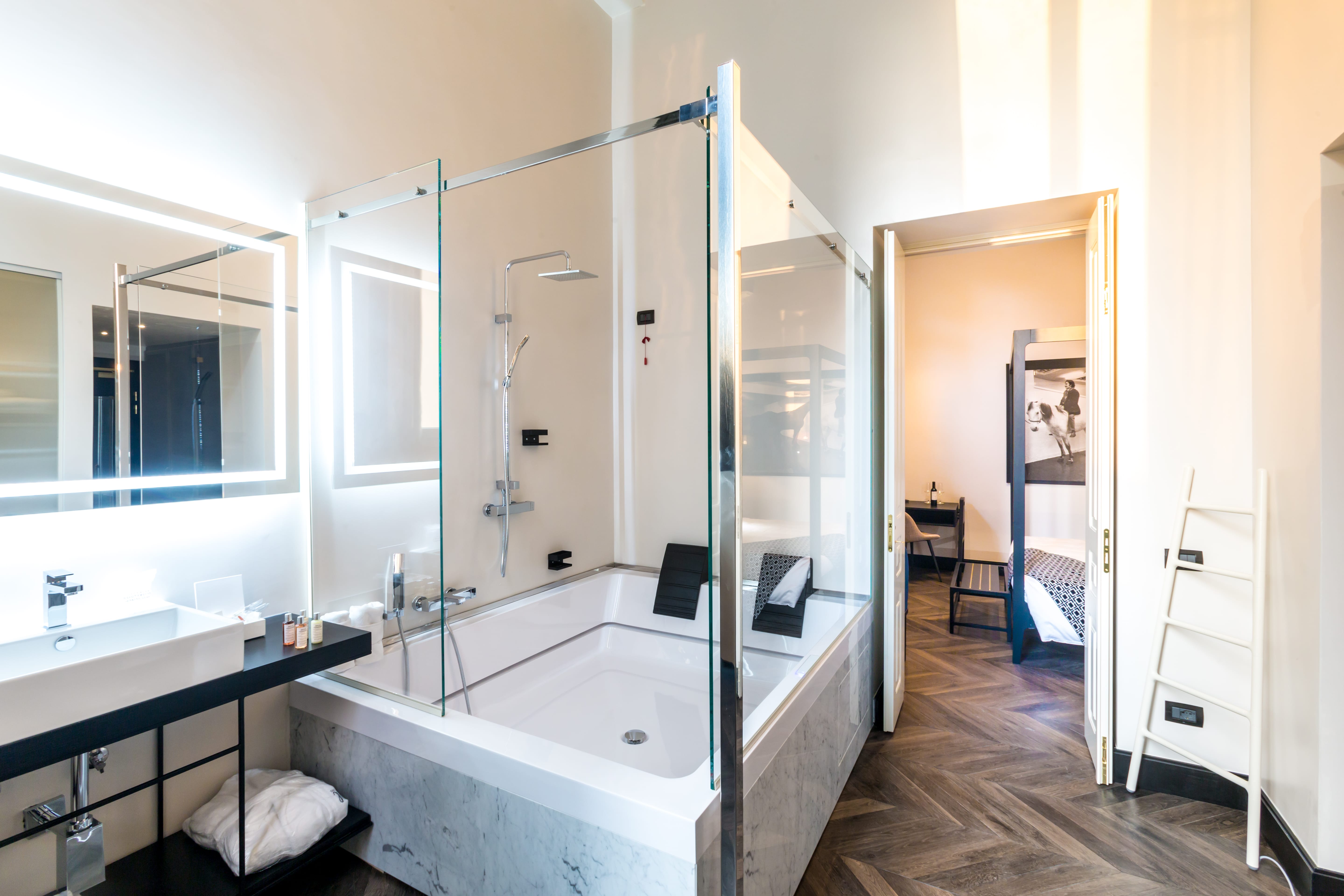 a bathroom with a tub and sink