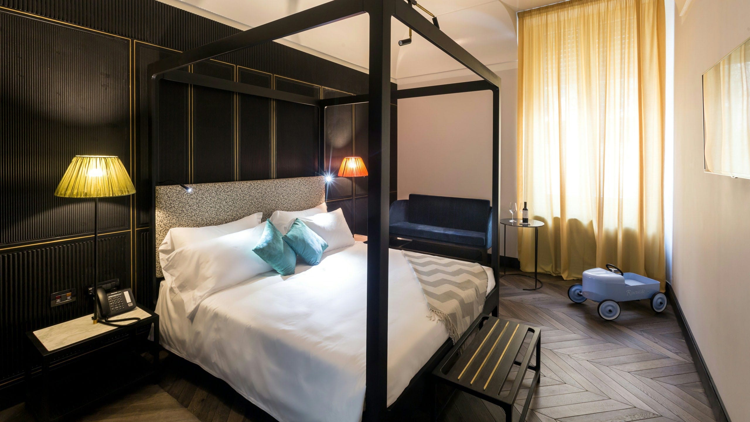 a bed with a blue cart