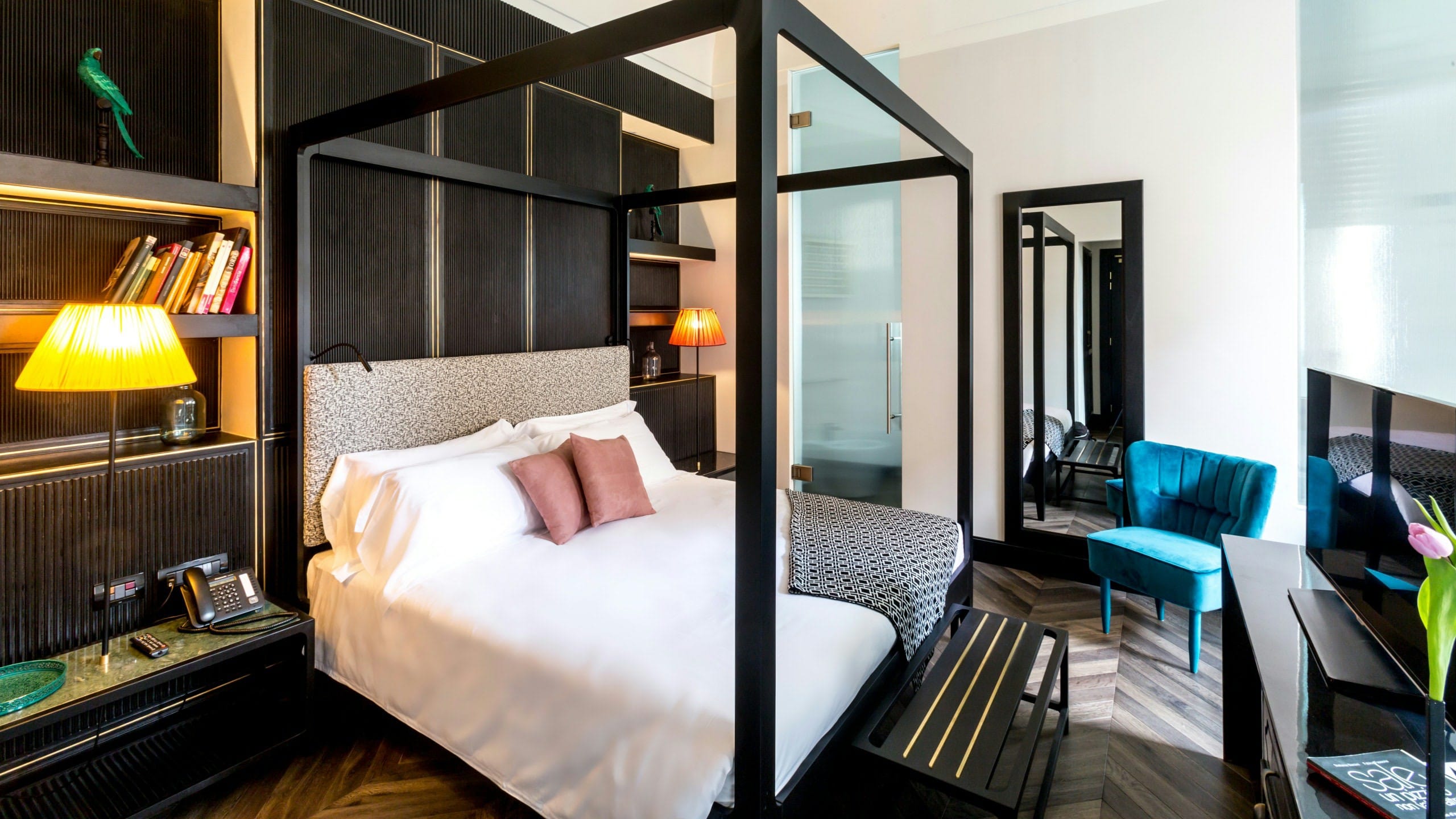 a bedroom with a large glass door