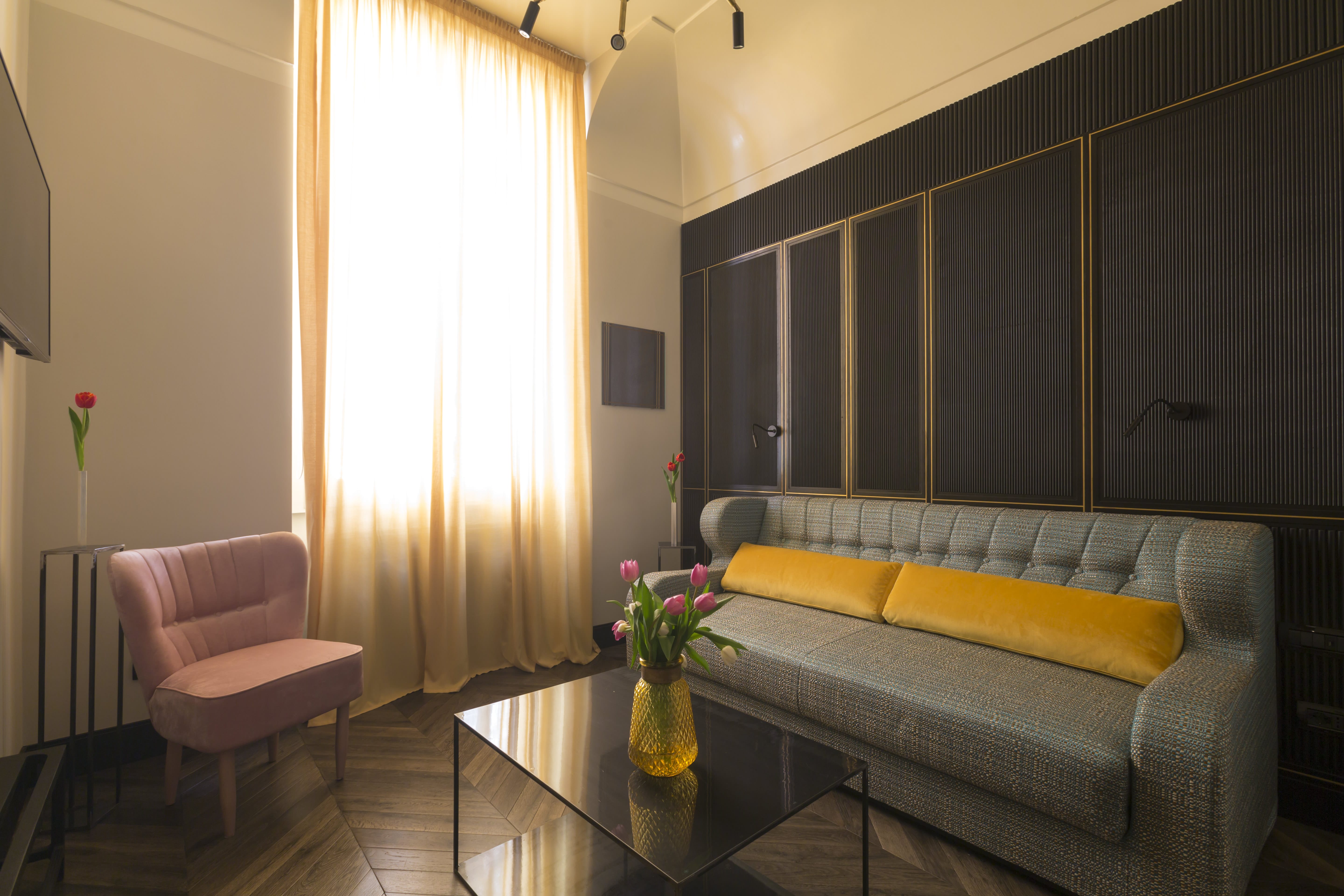 a living room with a couch and a table