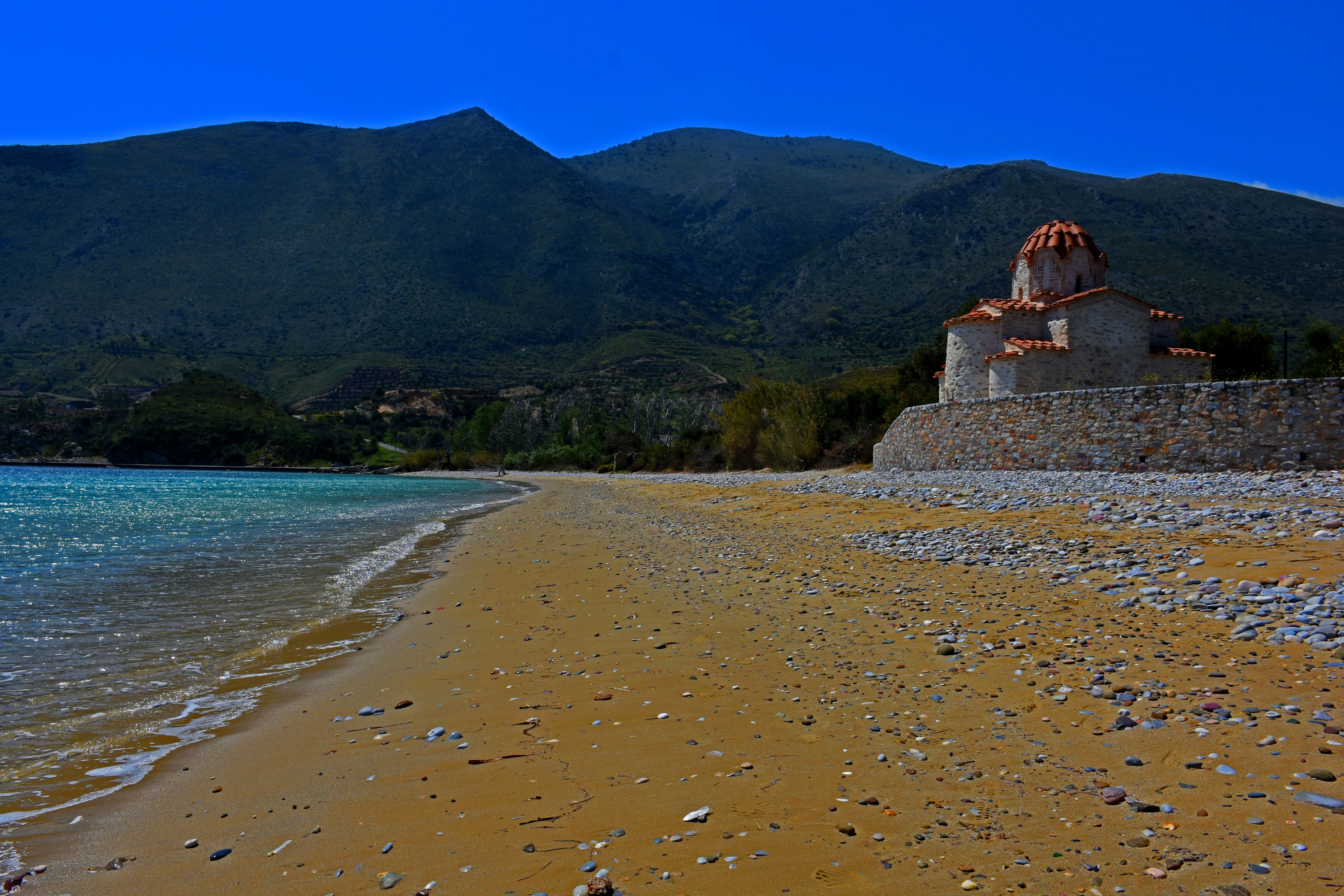 a beach with a building on it