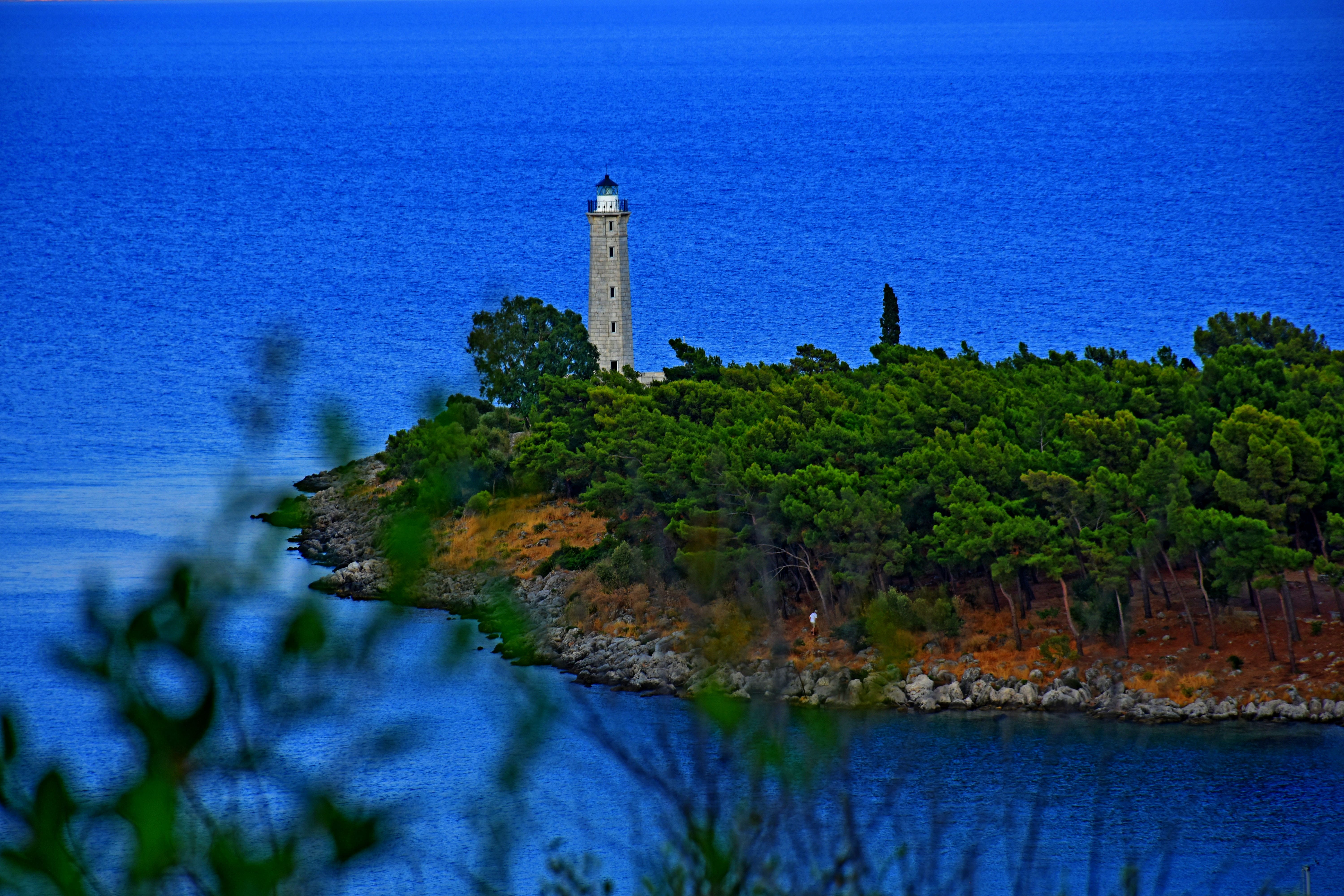 a lighthouse on a hill