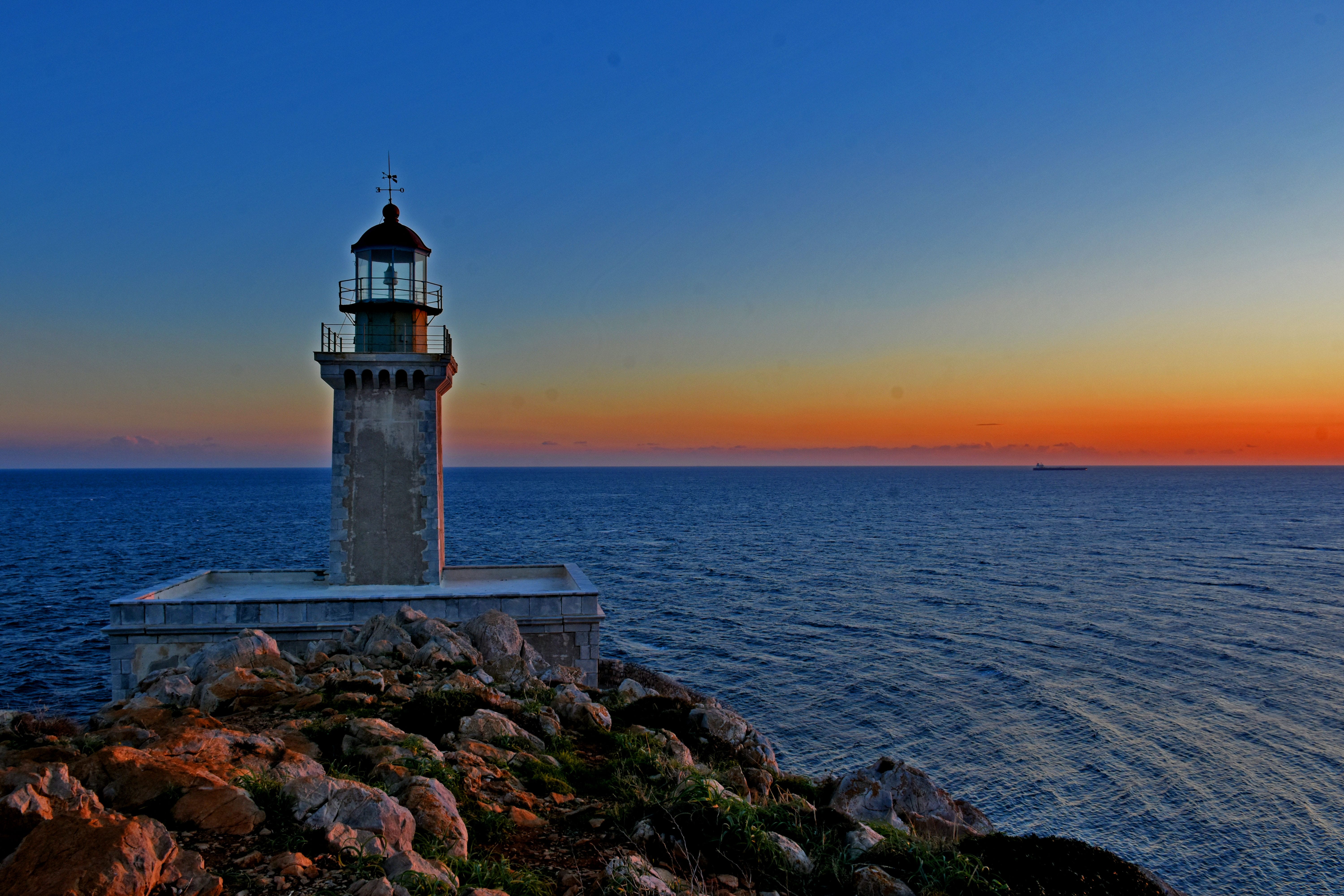 a lighthouse on a rocky shore