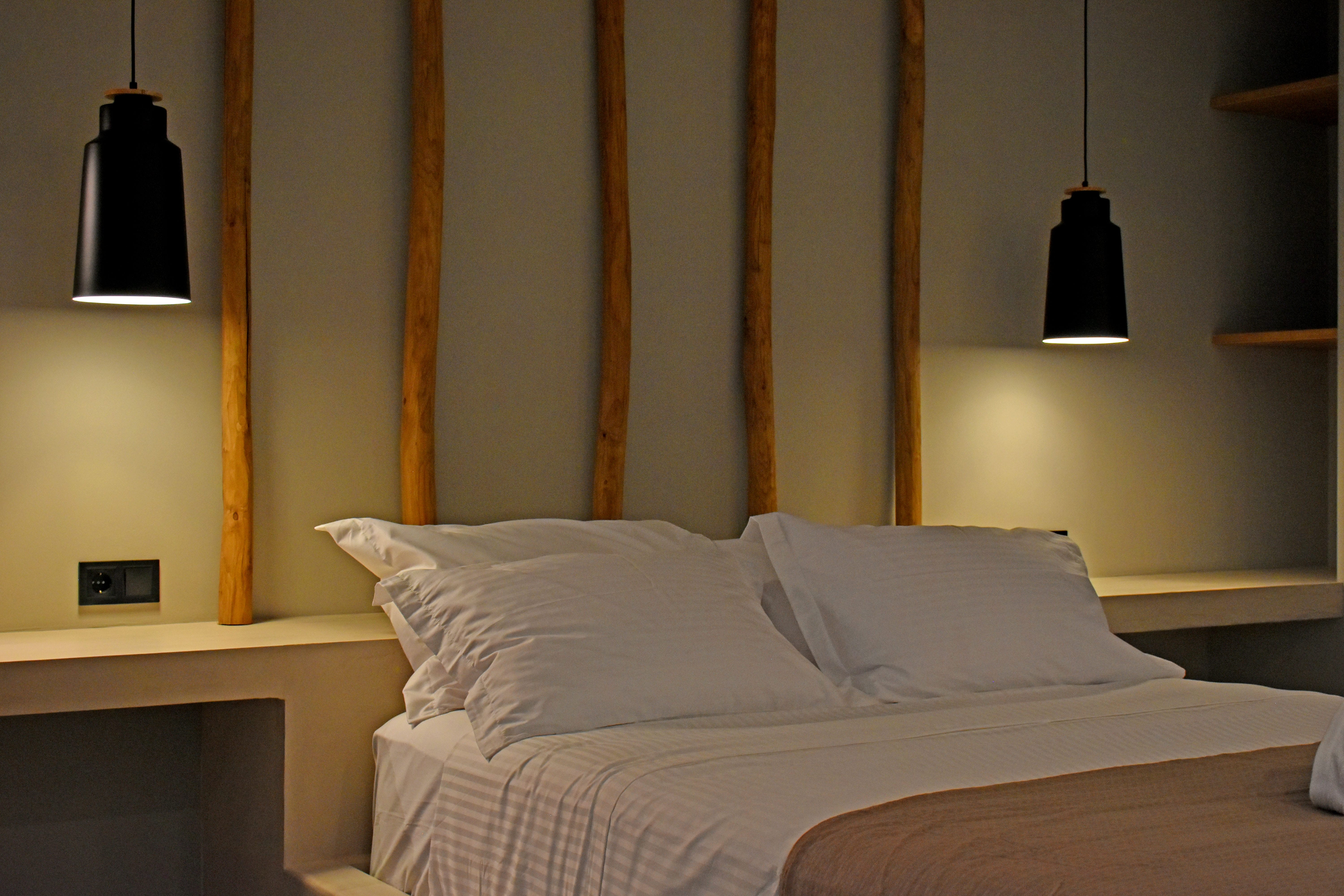 a bed with white pillows