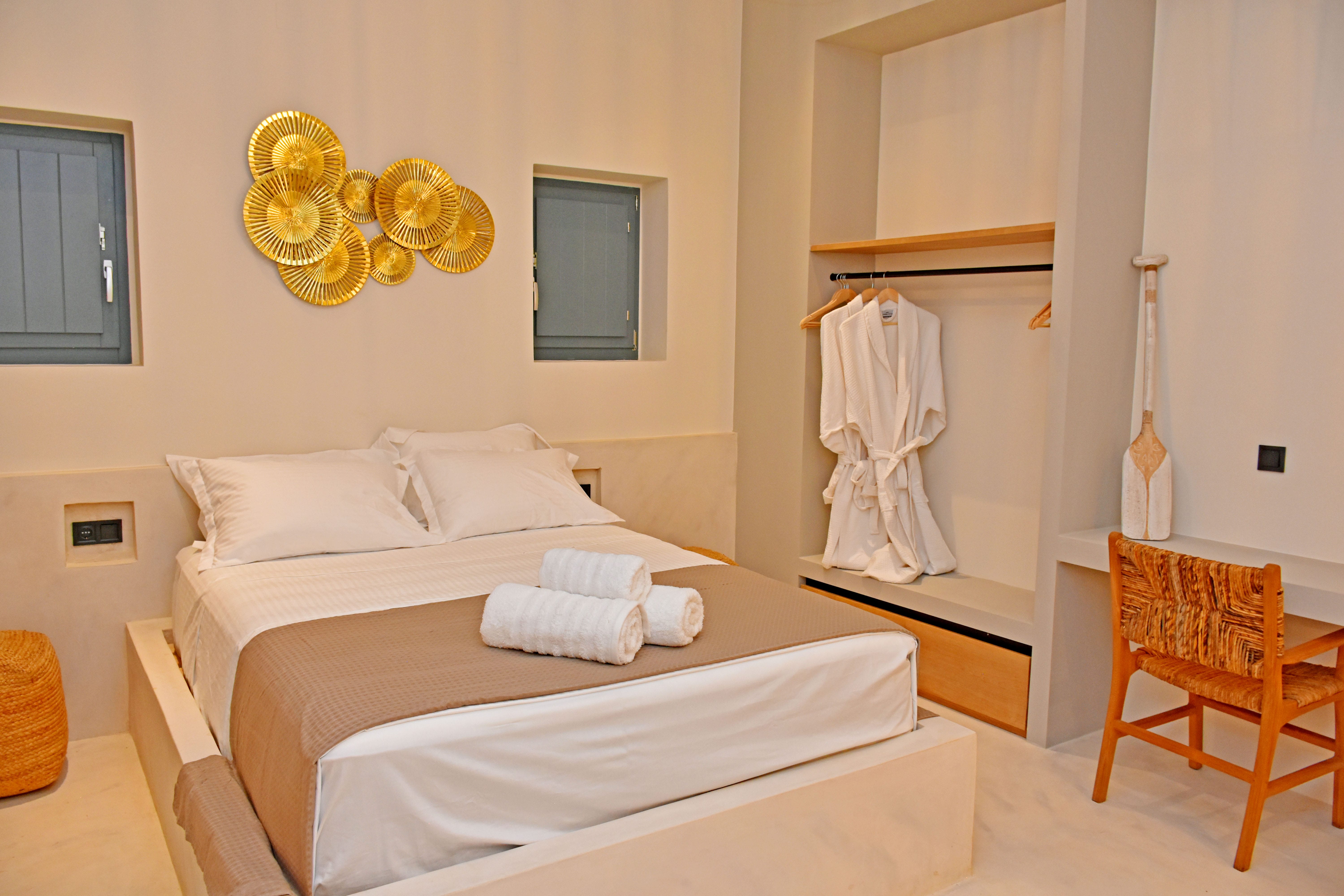 a bed with white sheets