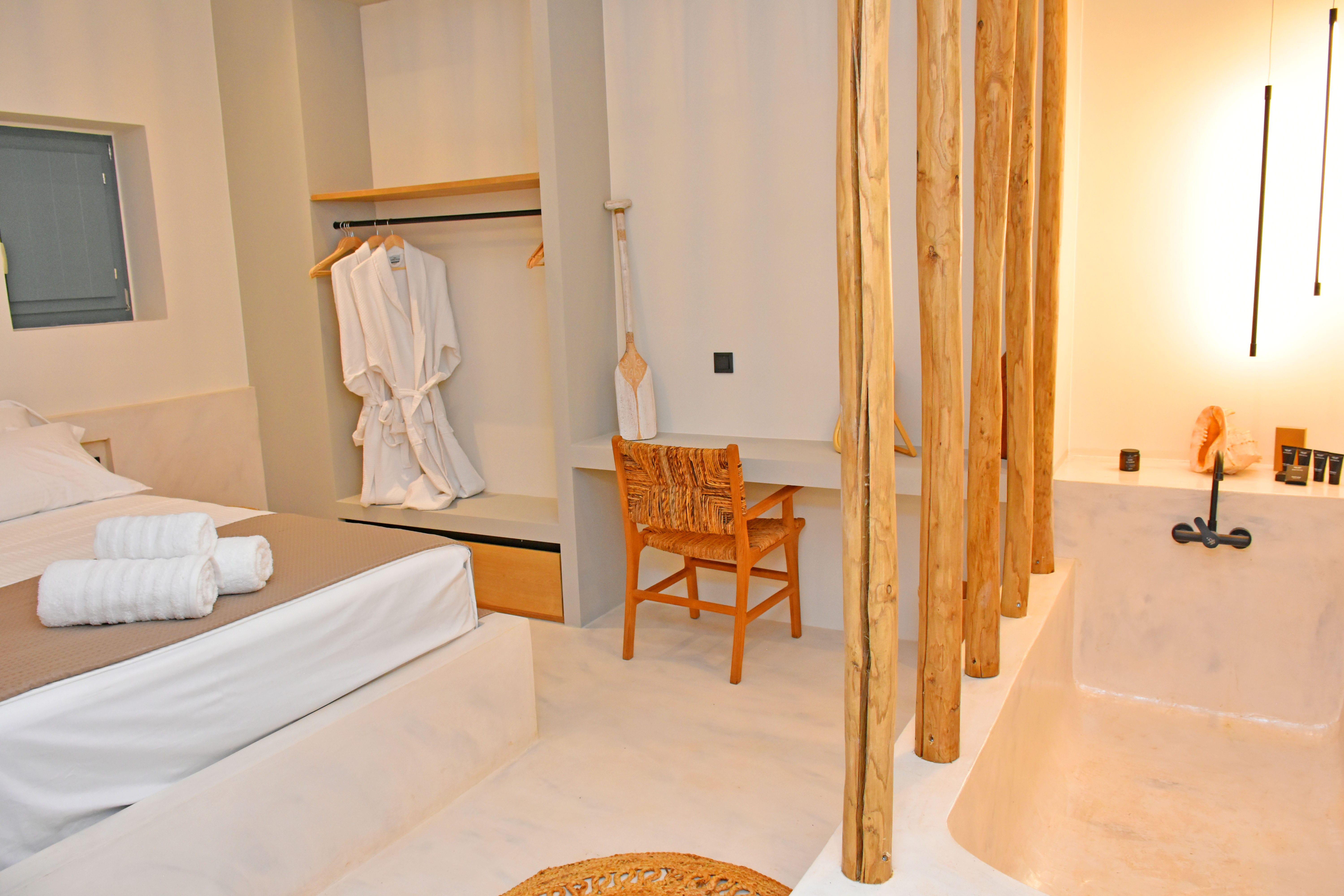 a bathroom with a bathtub and toilet