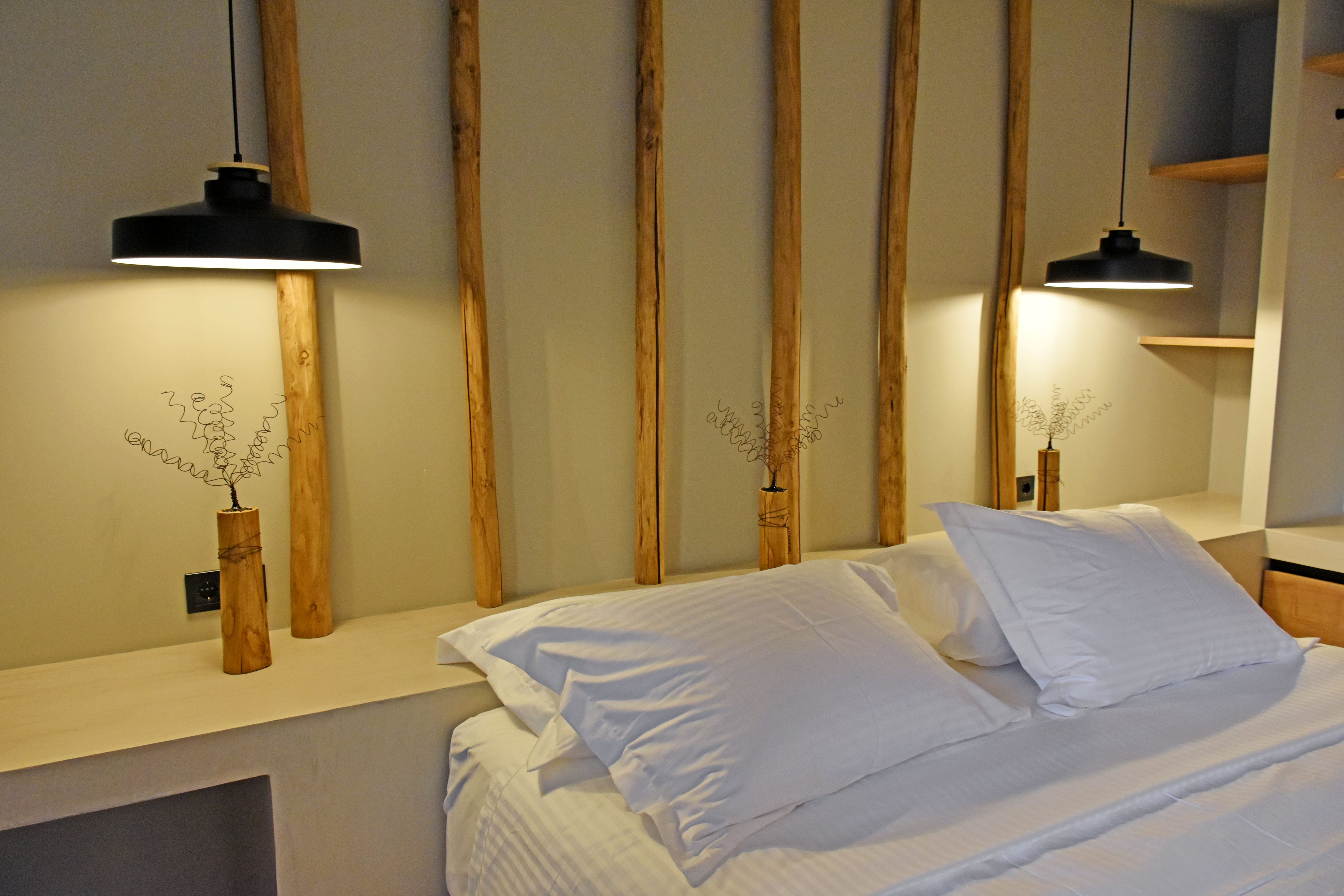 a bed with a white sheet