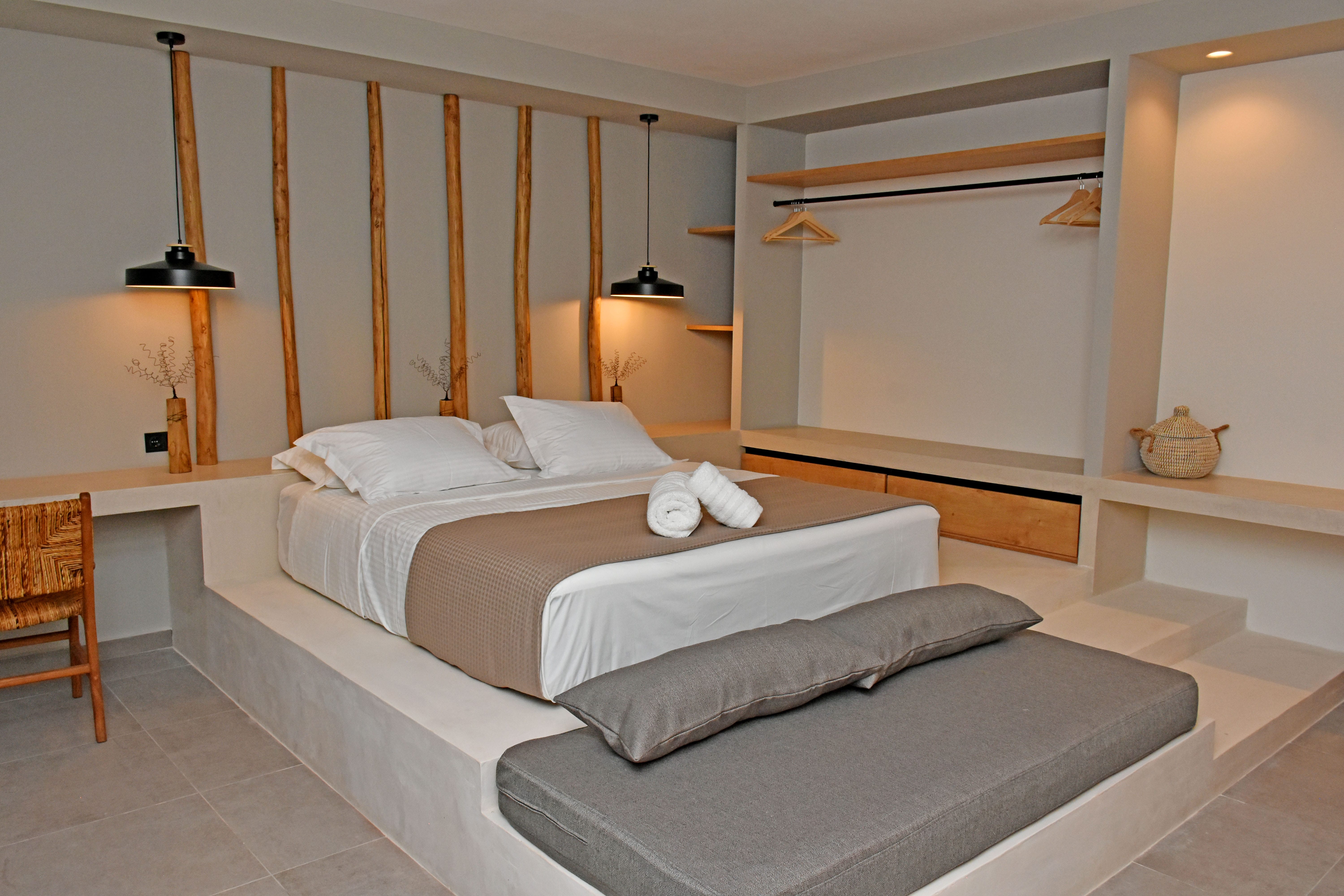 a bed with white sheets