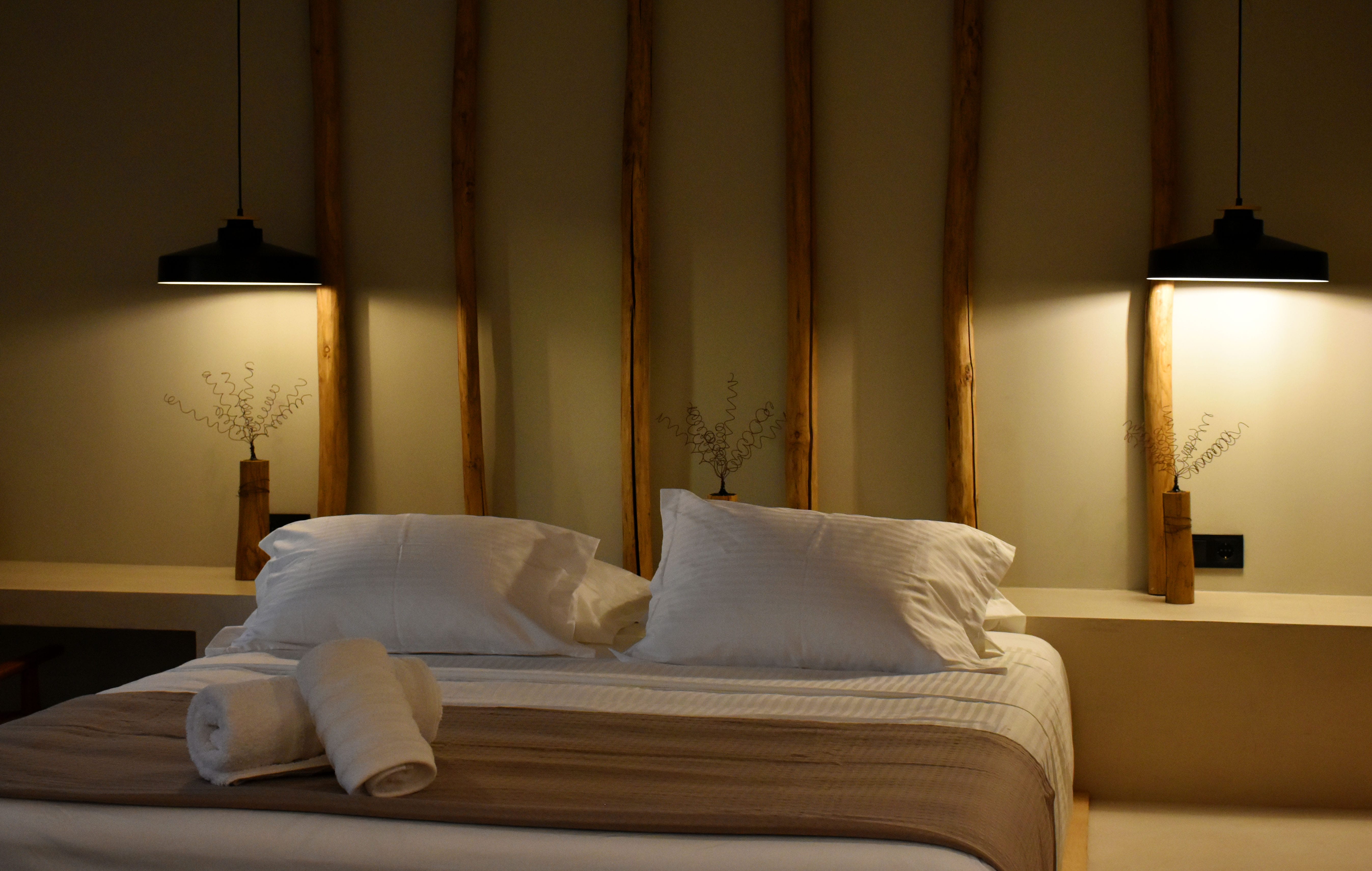 a bed with white sheets