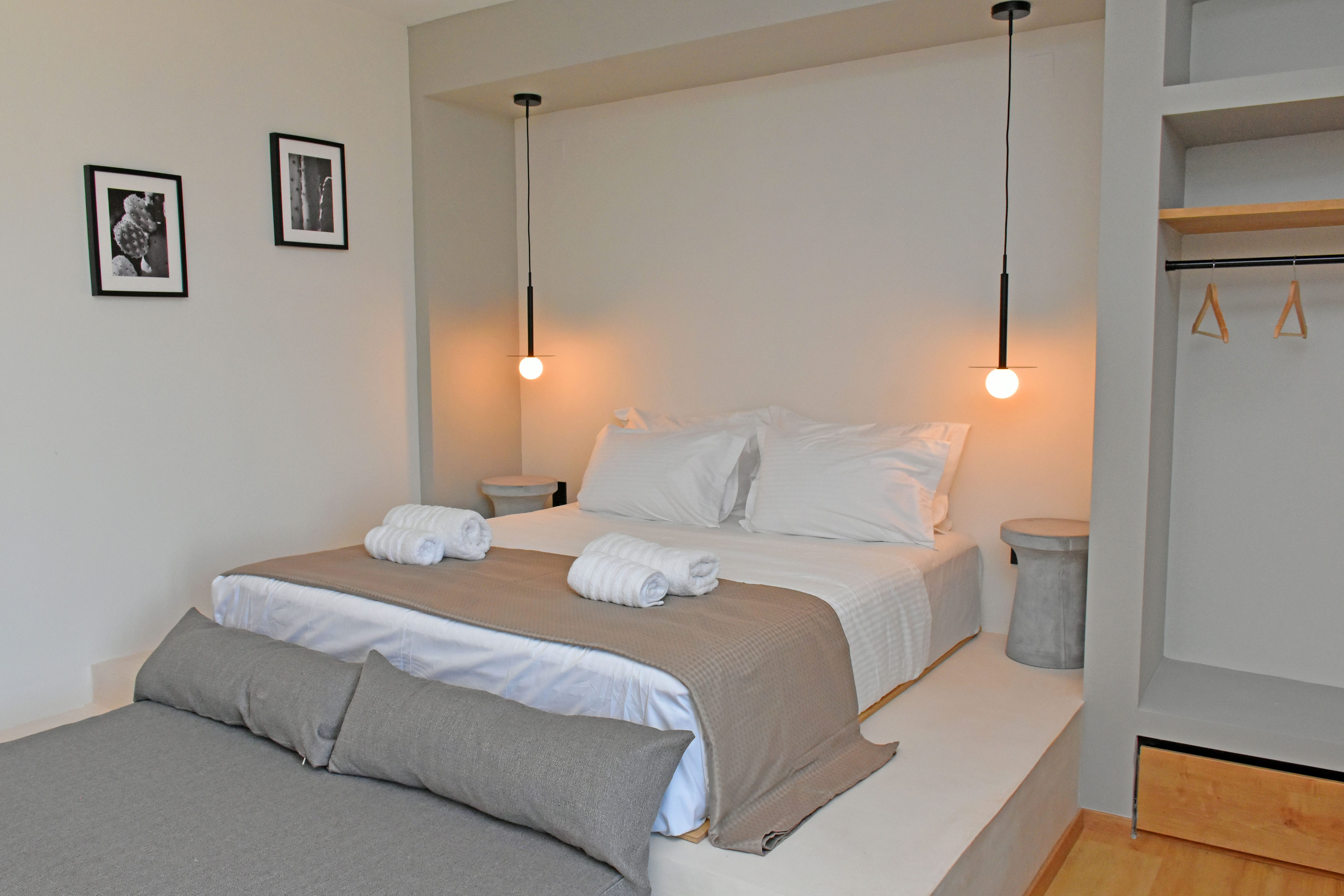 a bed with white sheets