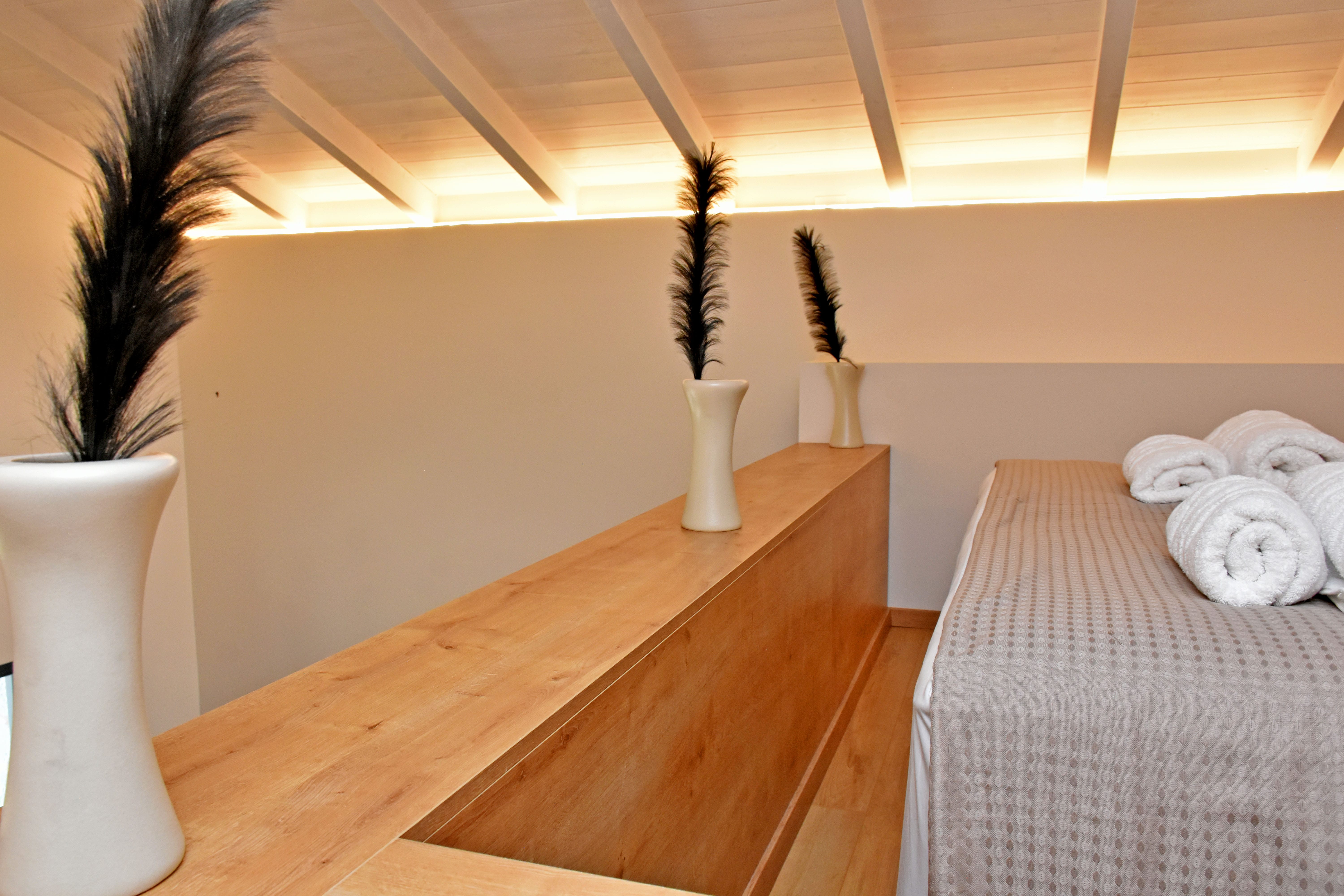 a room with a bed and a table