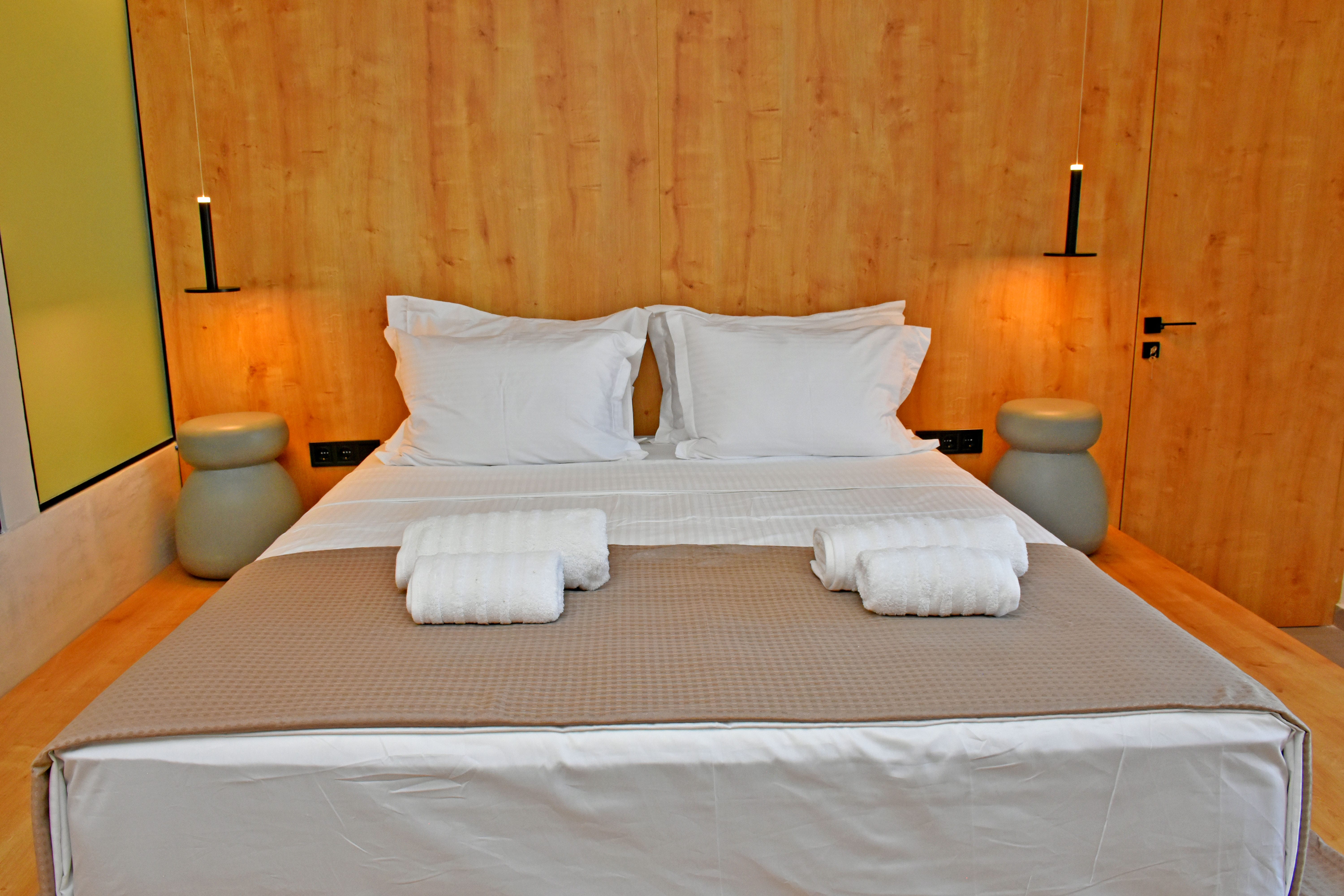 a bed with white sheets