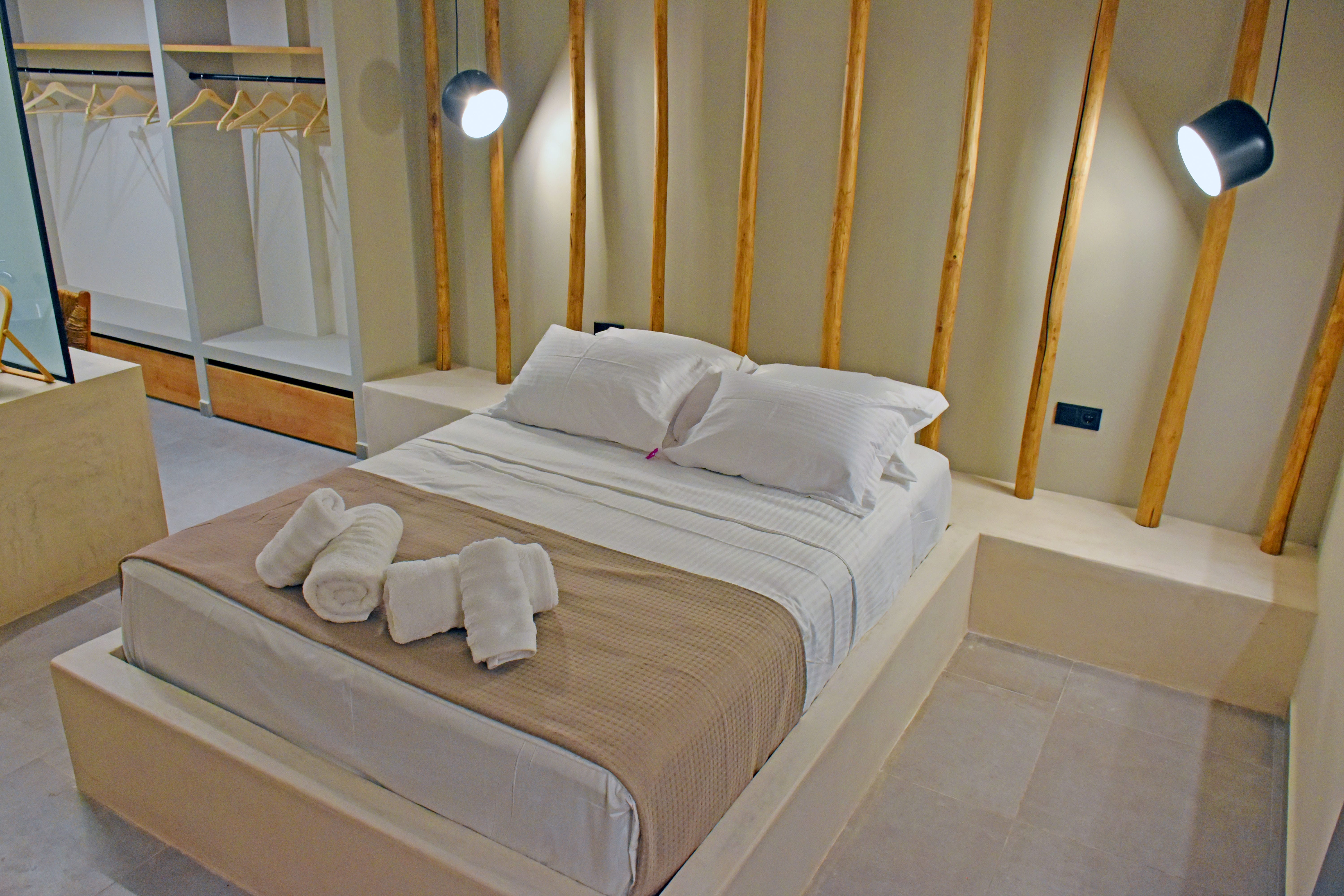 a bed with white towels on it