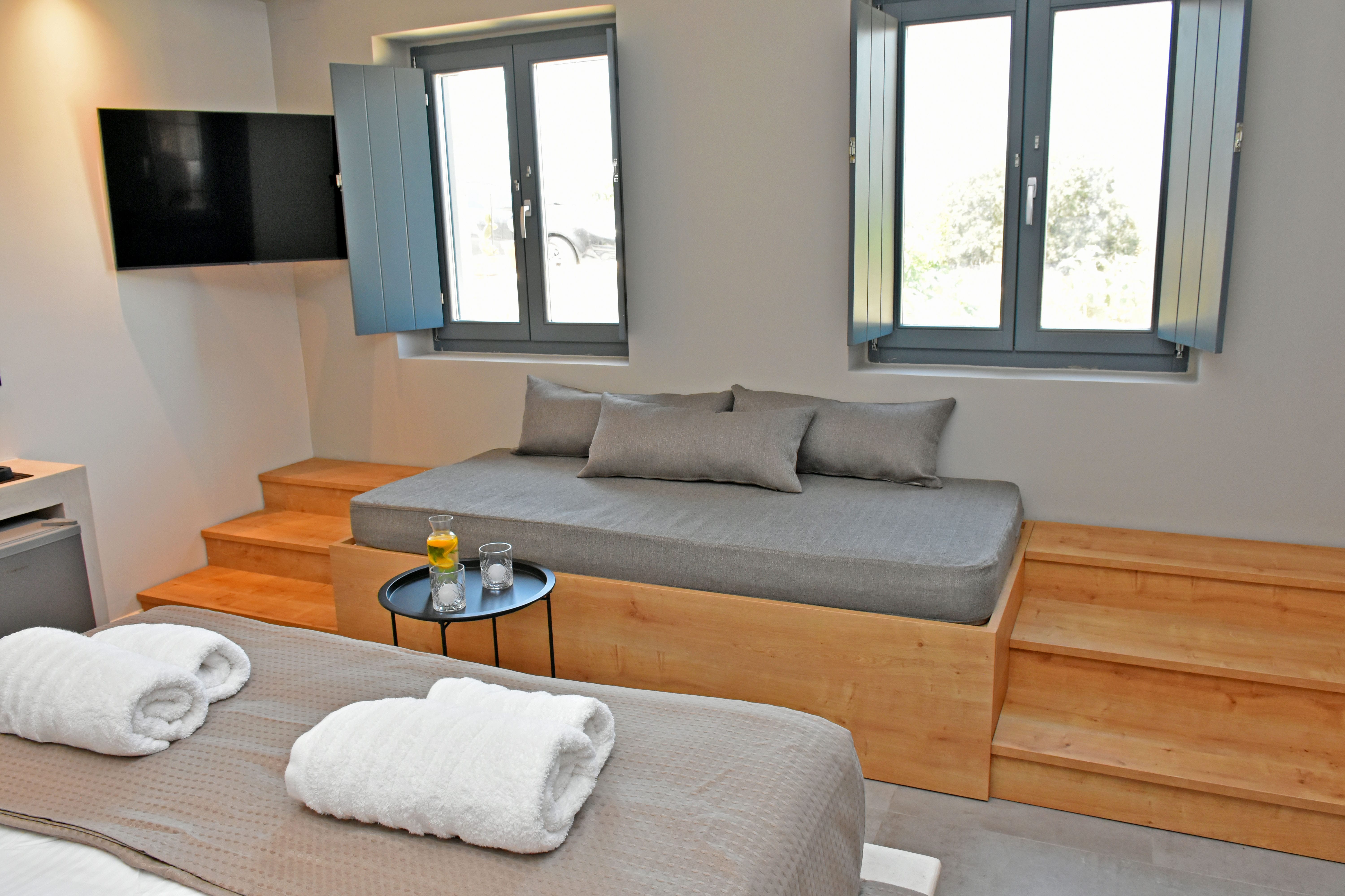 a room with a couch and a tv