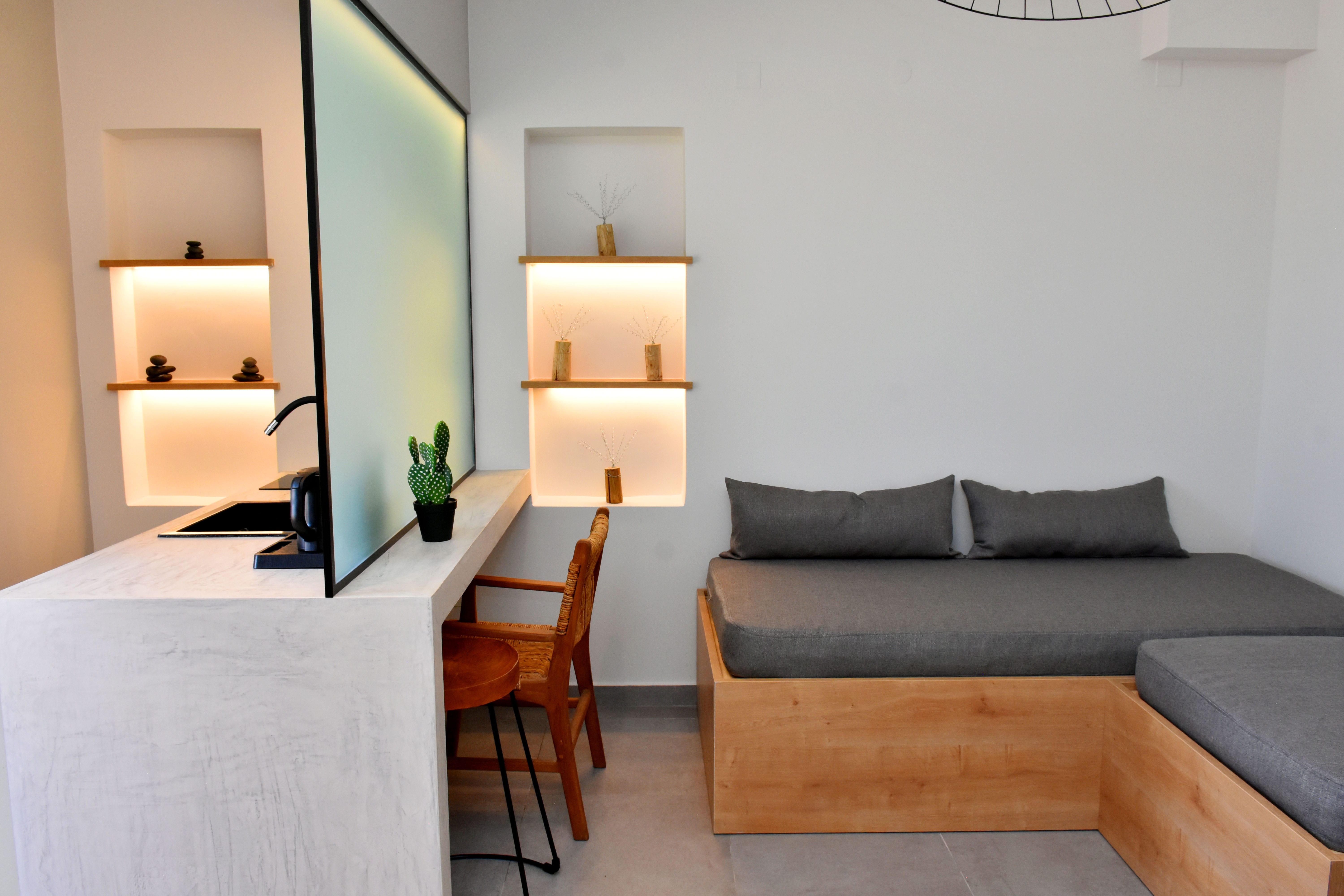 a room with a bed and a desk
