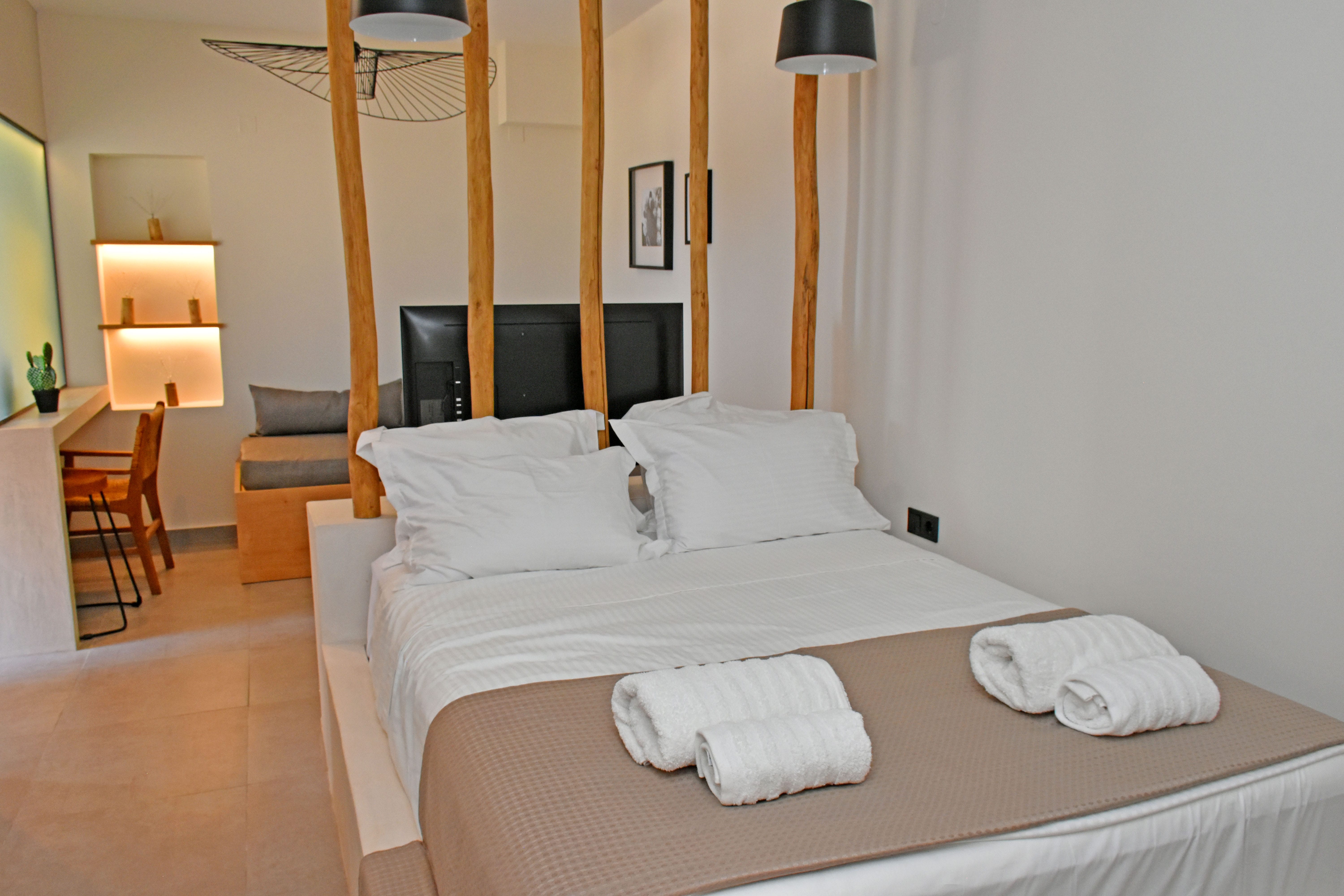 a hotel room with two beds