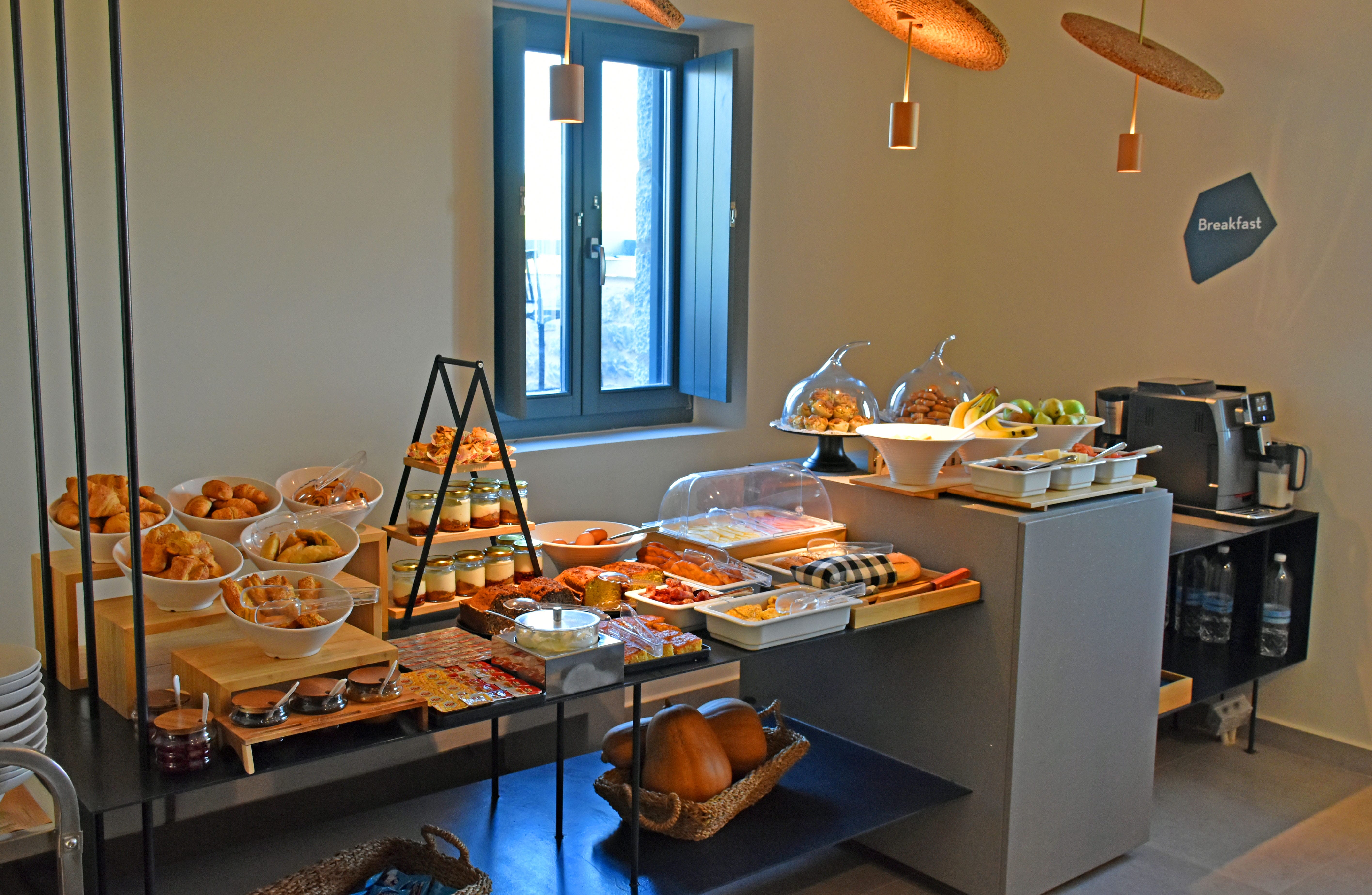 a kitchen with many food items on the counter