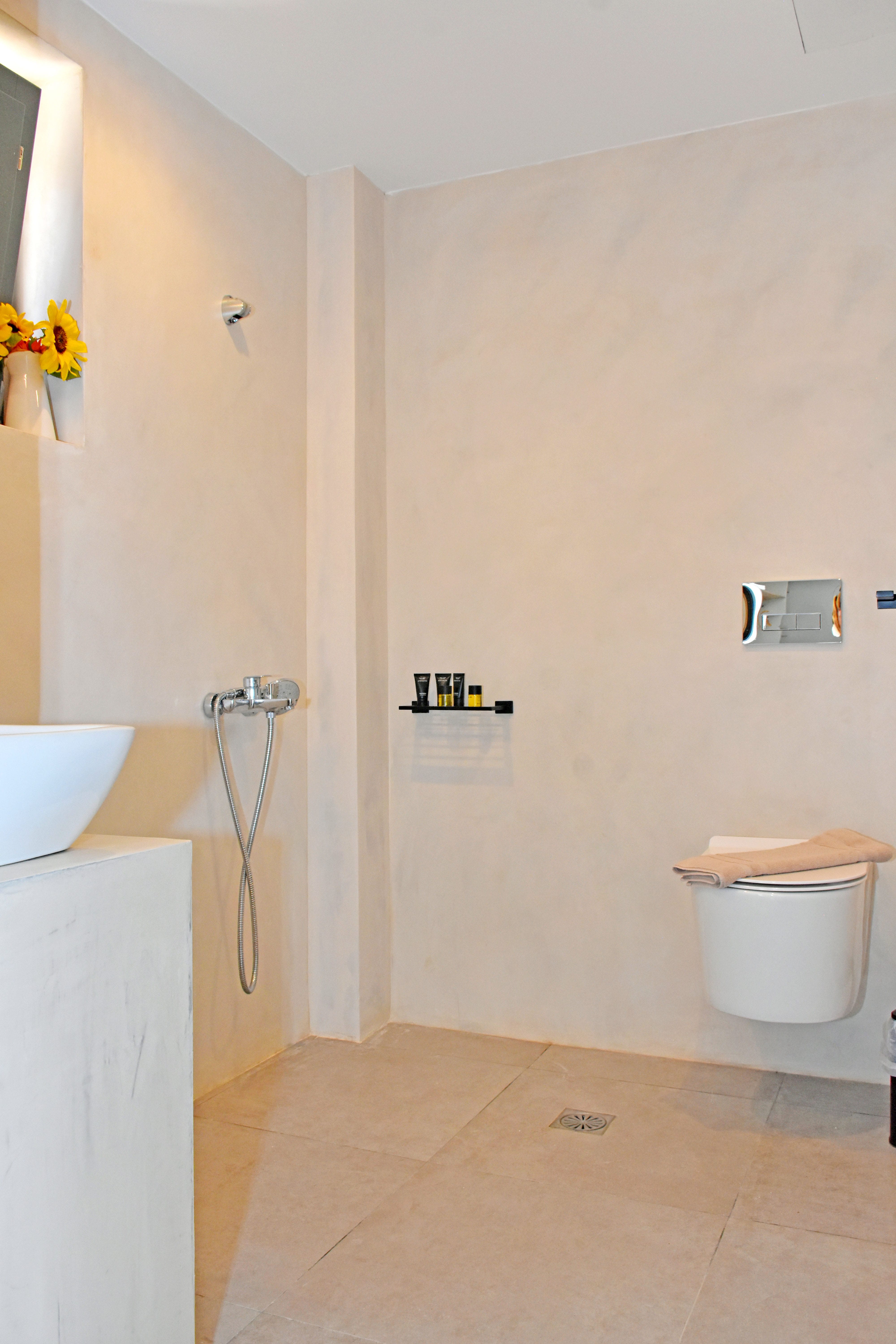 a bathroom with a toilet and sink