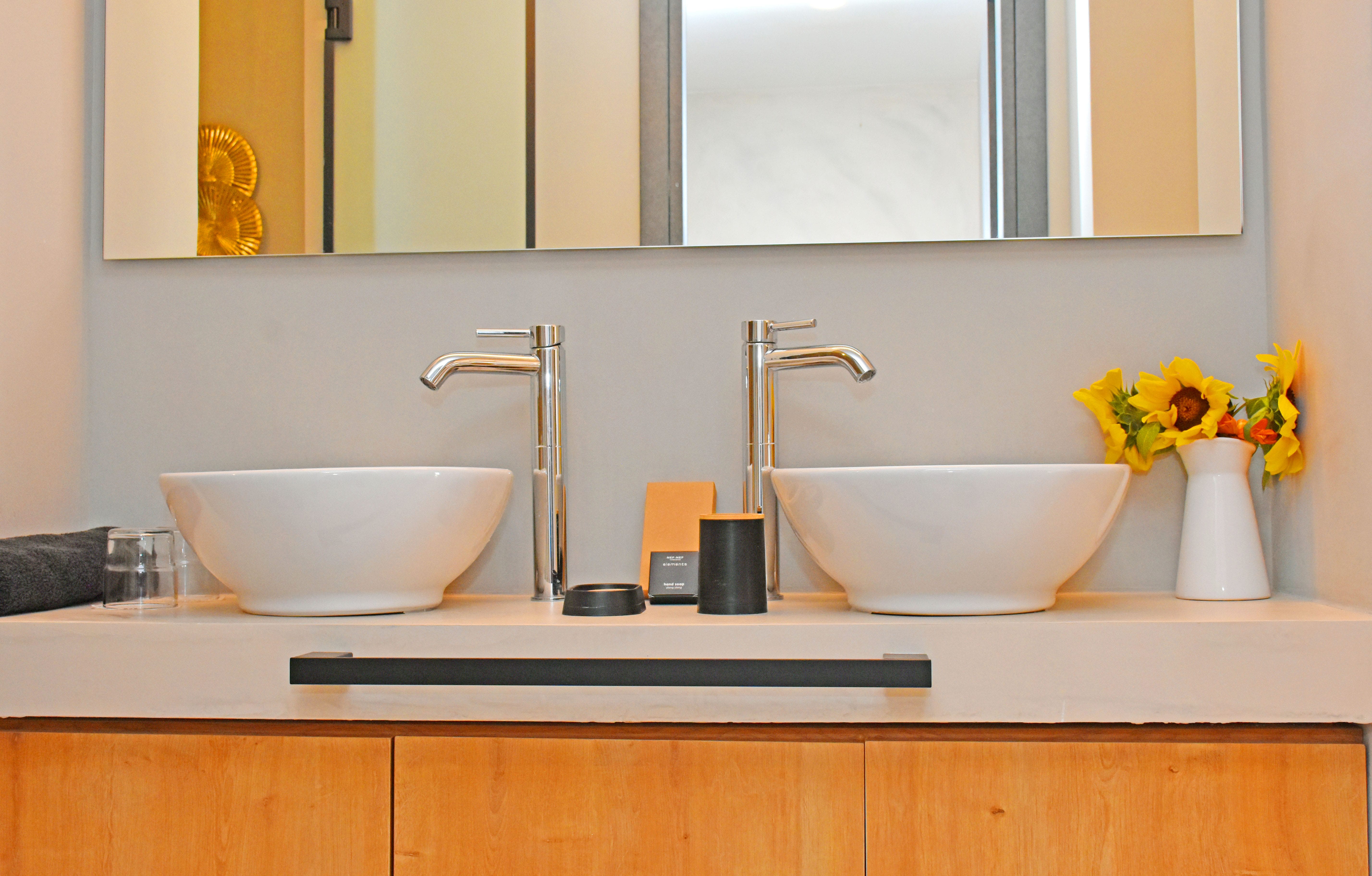 a couple of white bowls on a counter