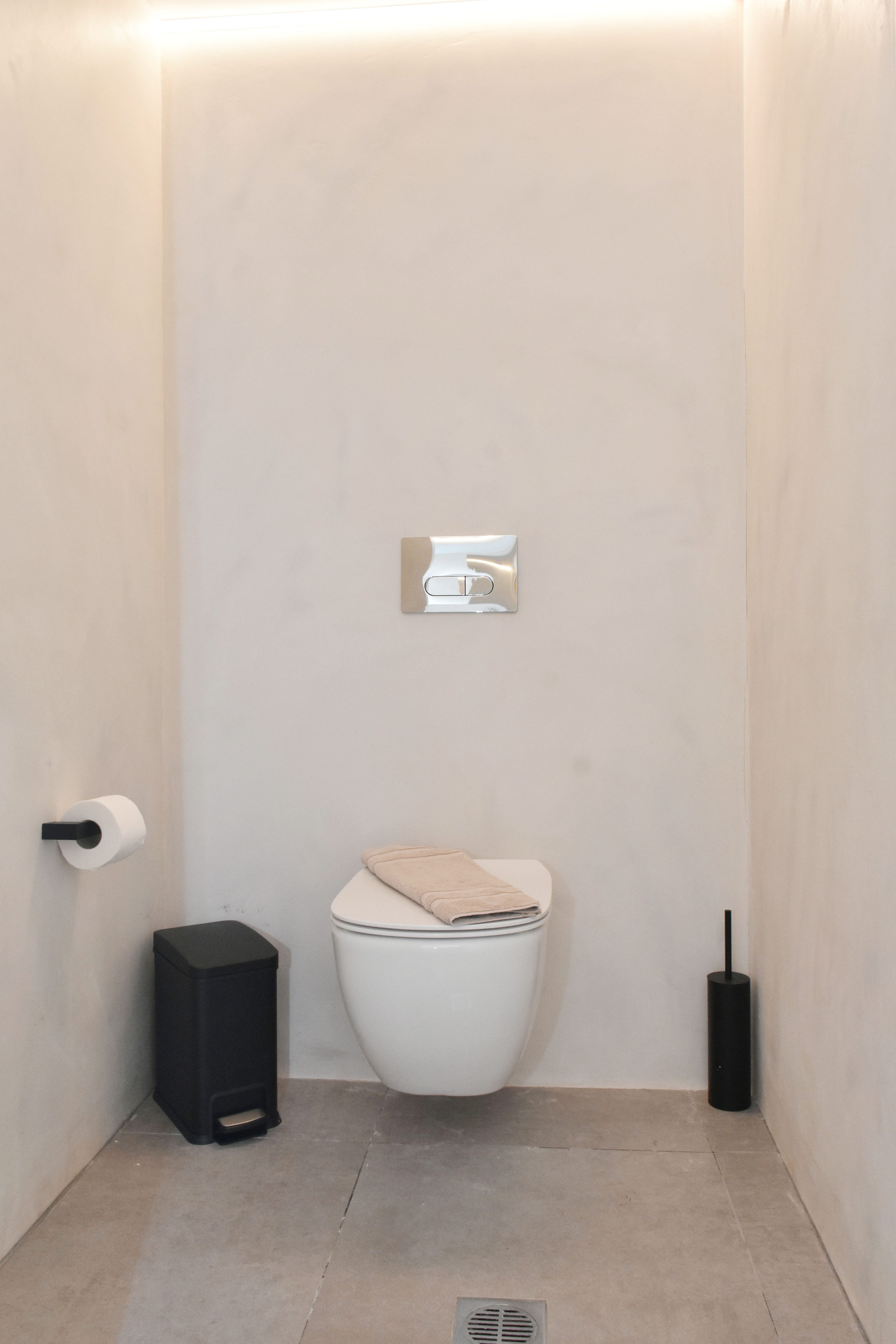 a toilet in a bathroom