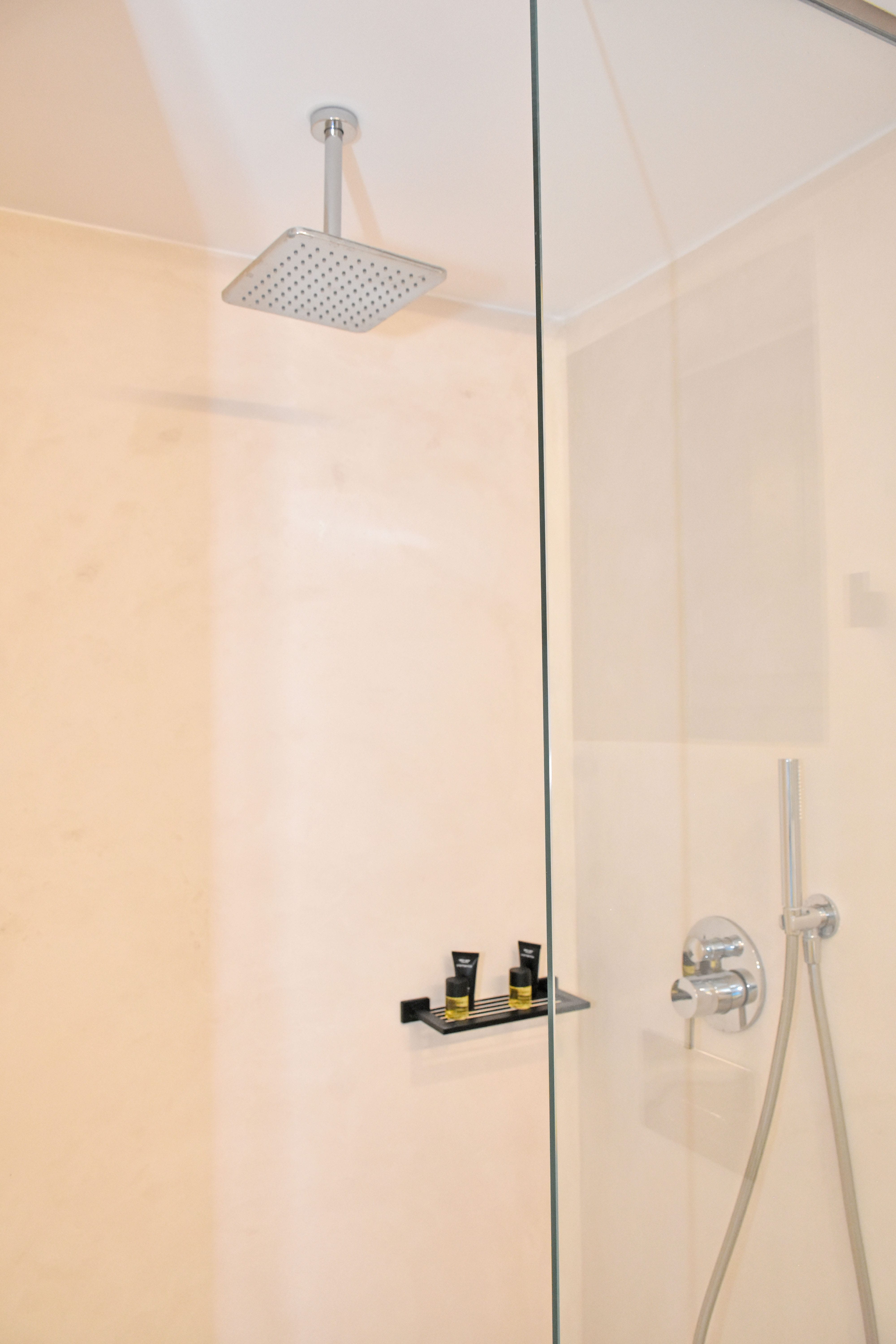 a shower with a glass door
