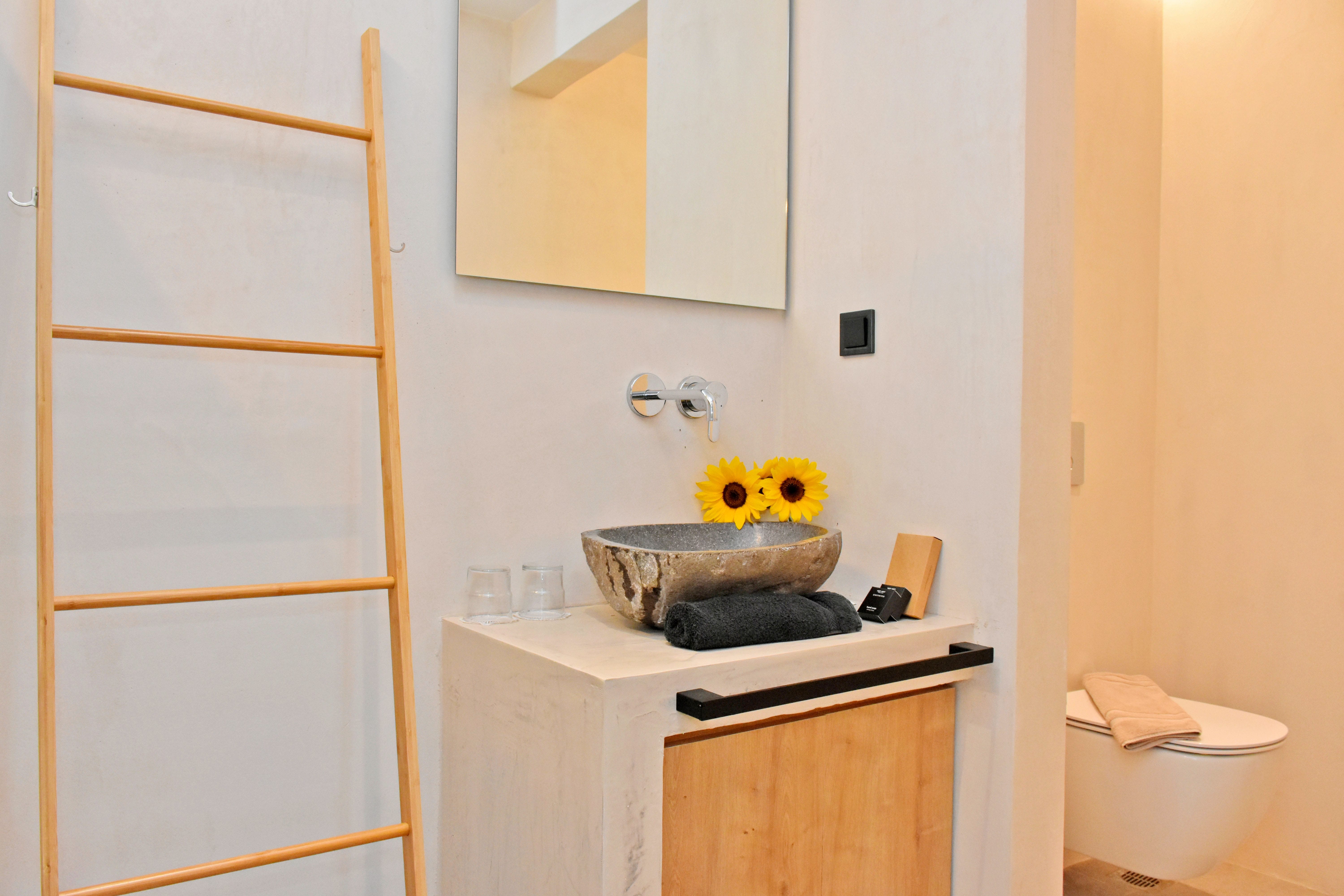 a sink with yellow ducks in it