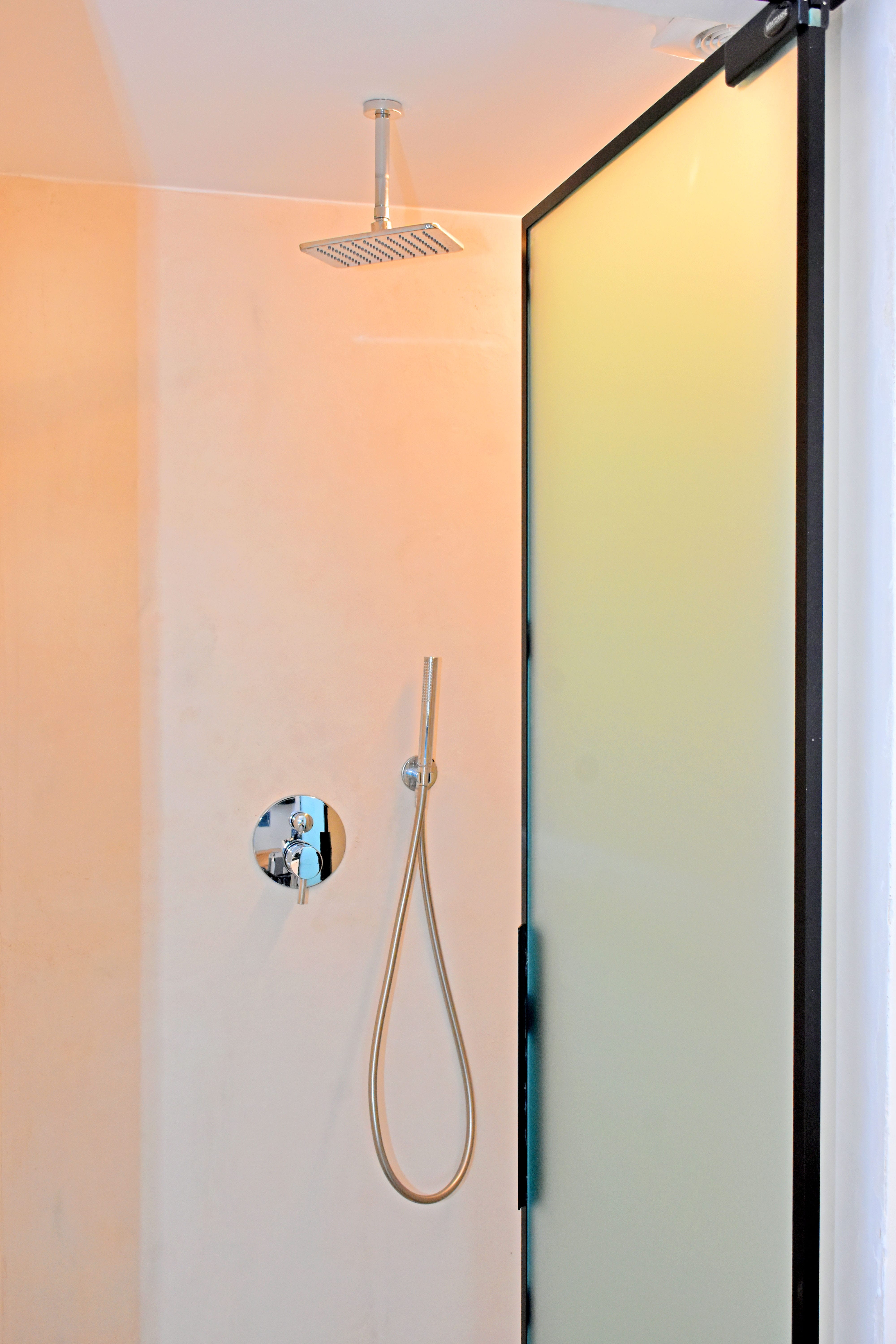 a shower with a handle