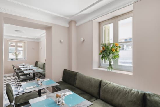 a living room with a couch and a table