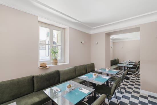 a living room with a couch and a table