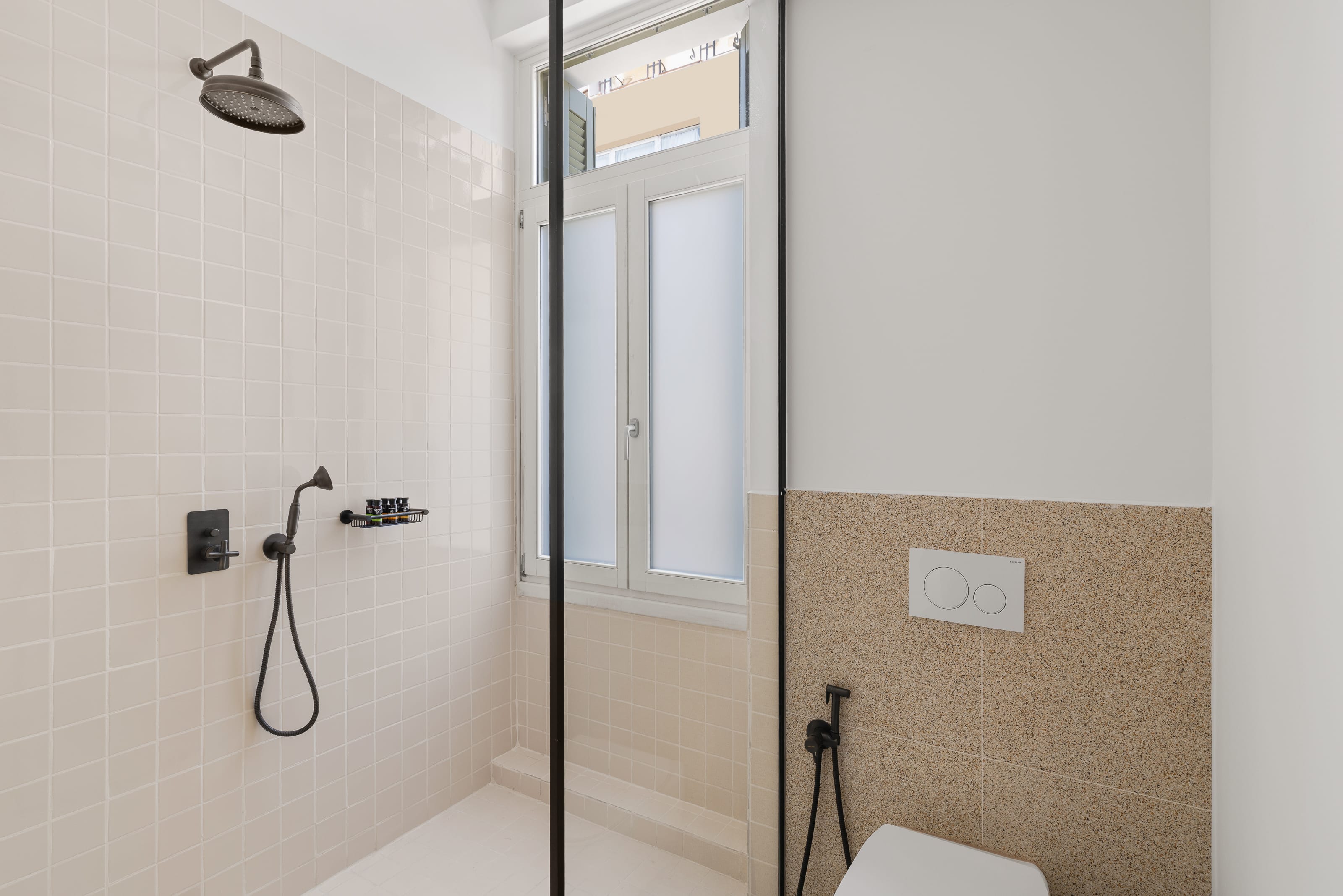 a bathroom with a shower unit
